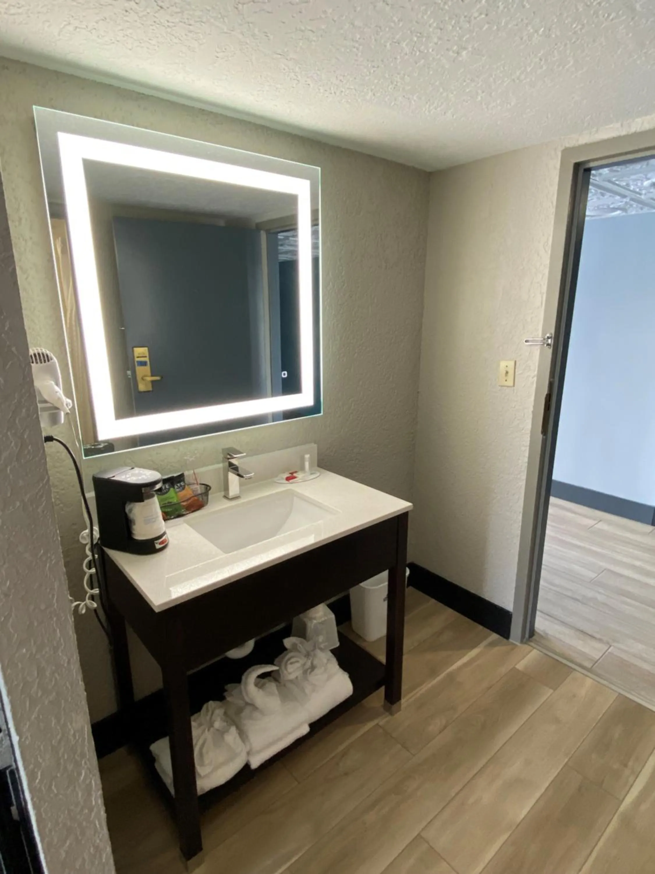 Bathroom in Days Inn & Suites by Wyndham Fort Pierce Midtown