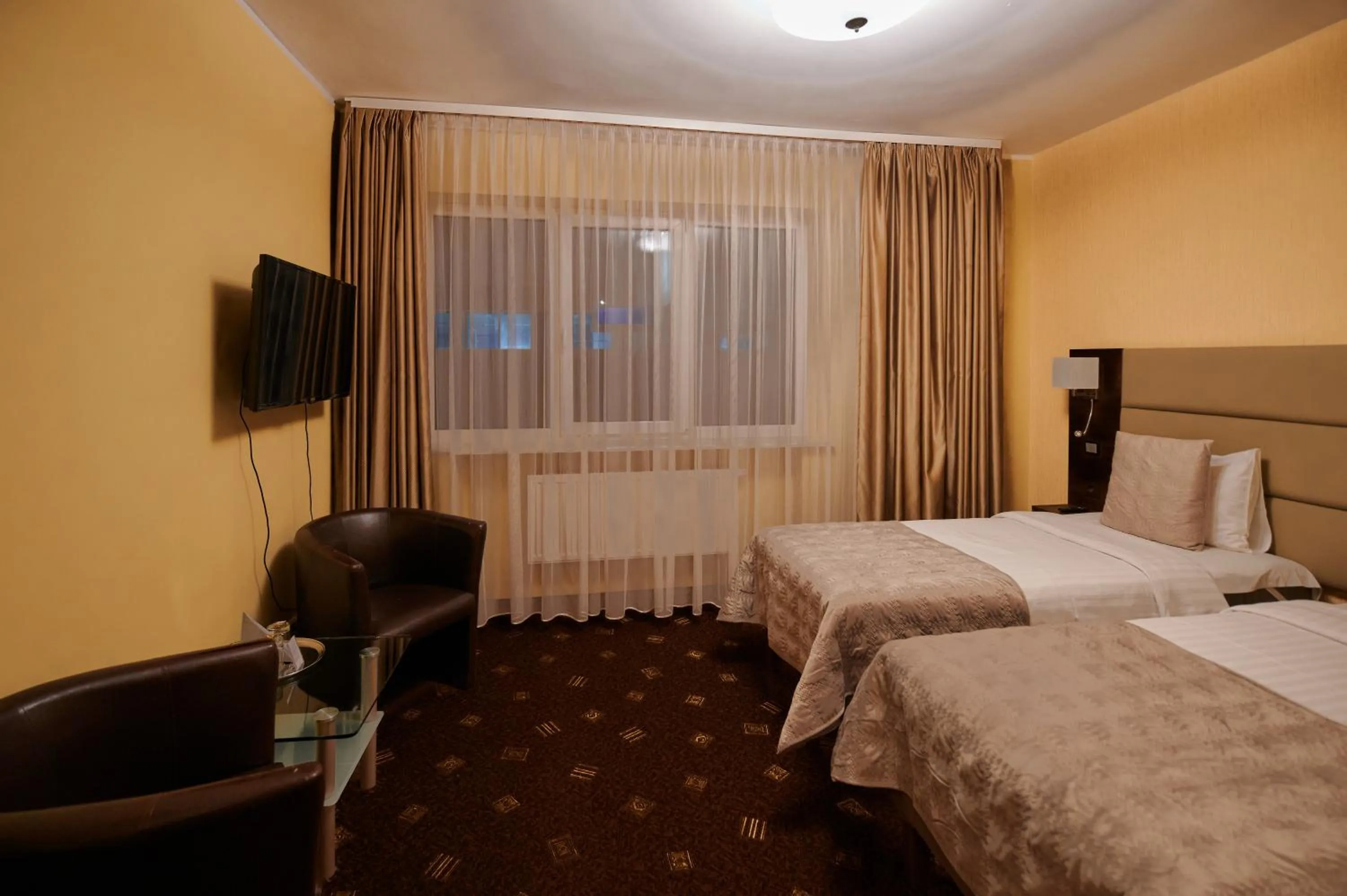 Bed in Olympus Hotel