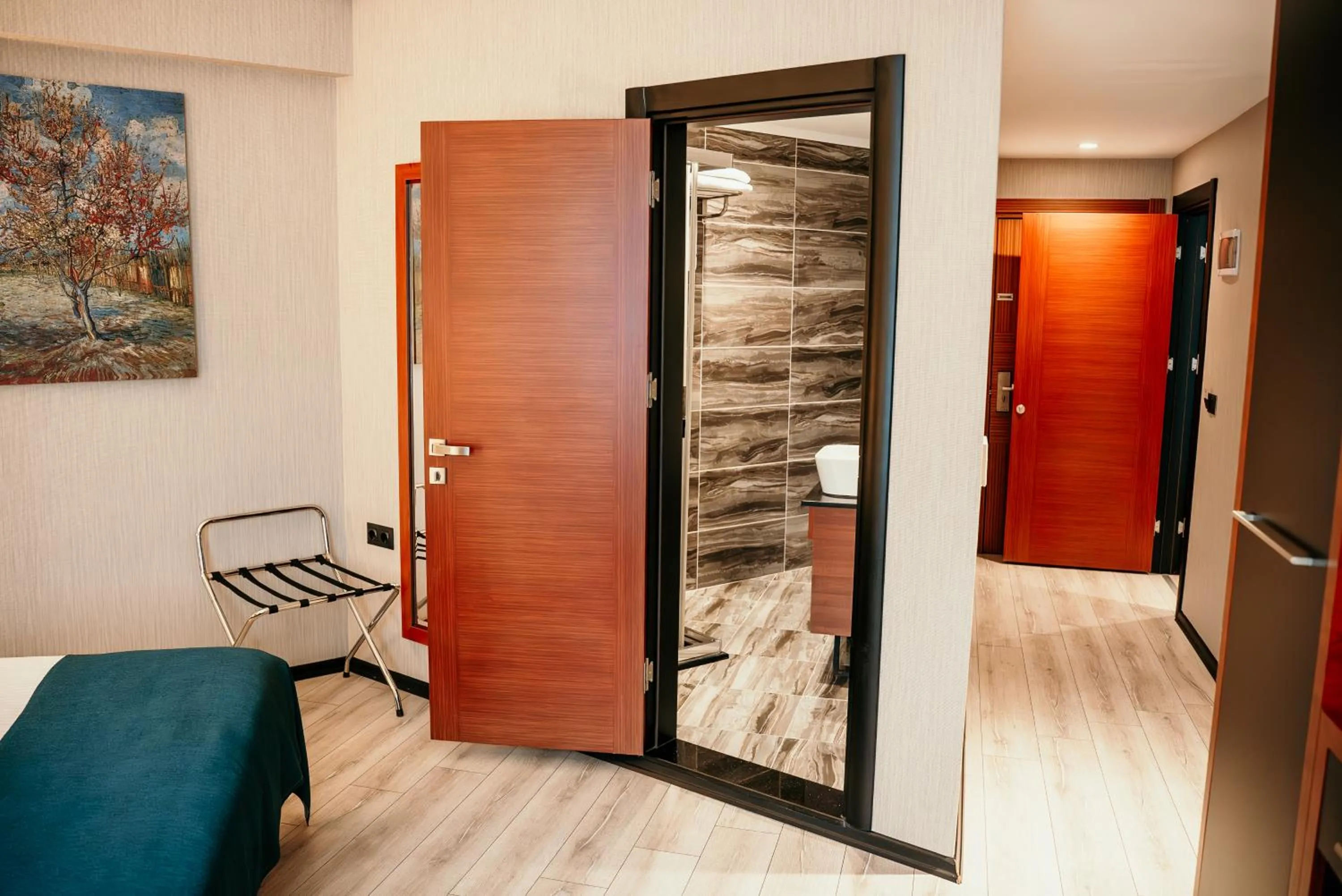 Bed in Grand Vaves Hotel