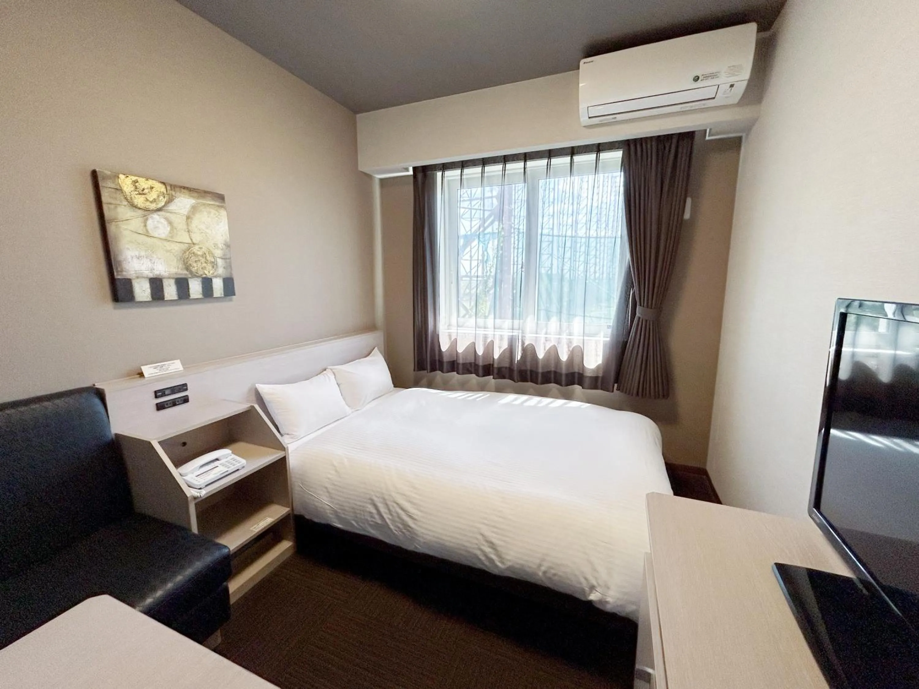 Photo of the whole room, Bed in Route Inn Grantia Komatsu Airport