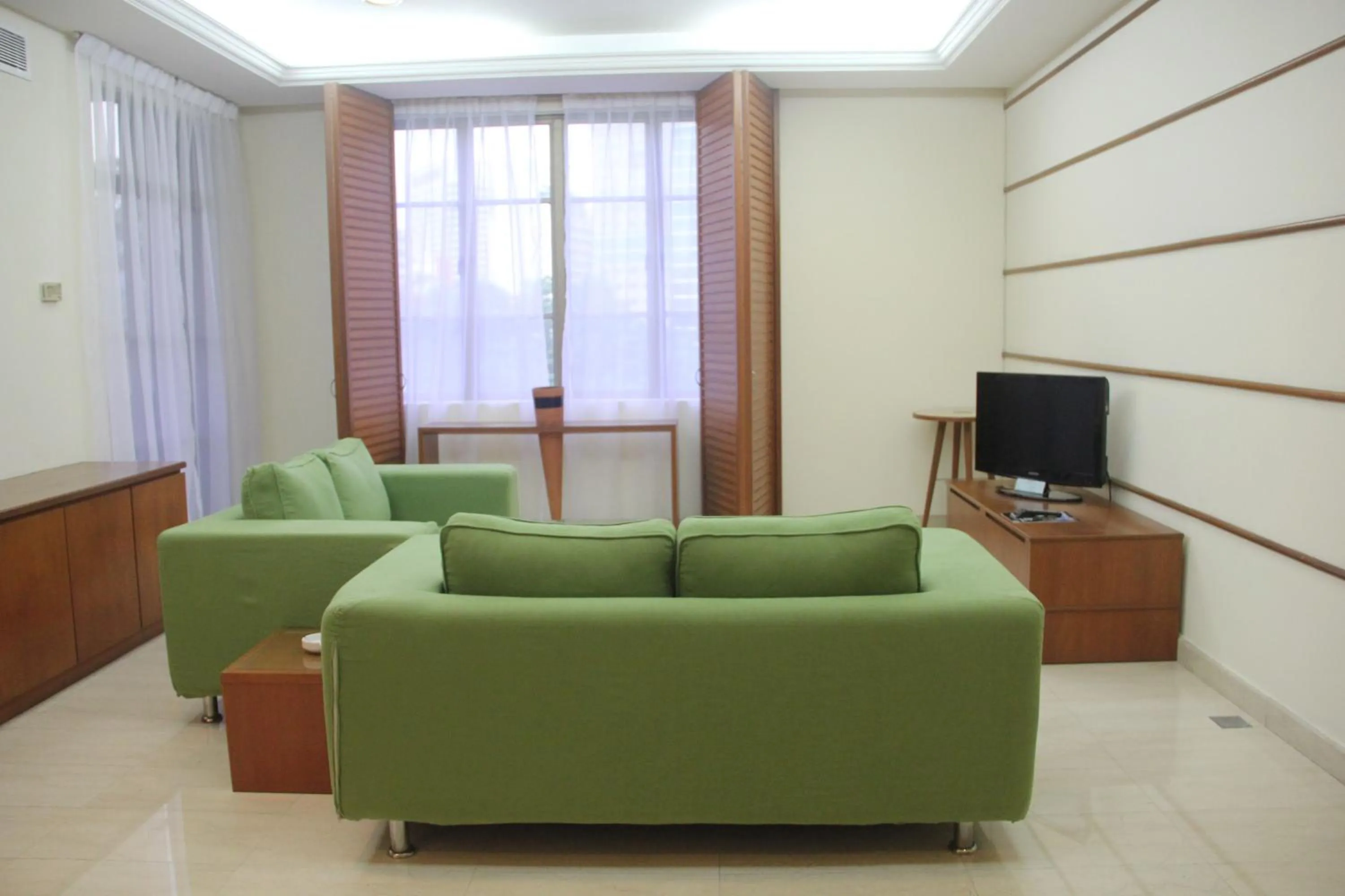 Living room in The Maple Suite