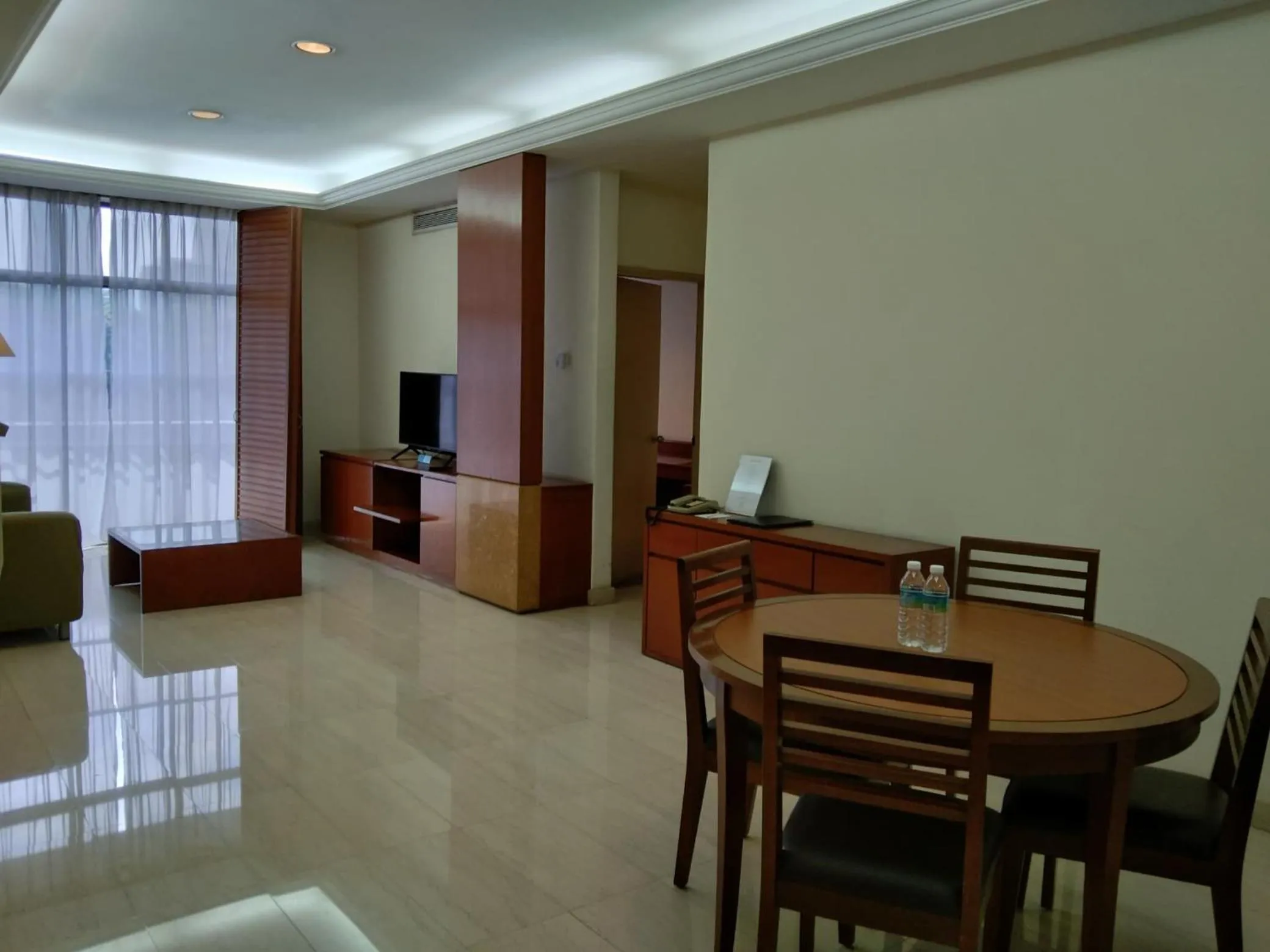 Living room in The Maple Suite