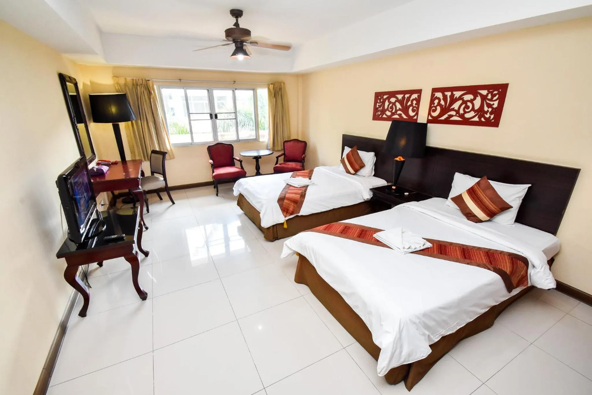 Bed in Piman Garden Boutique Hotel