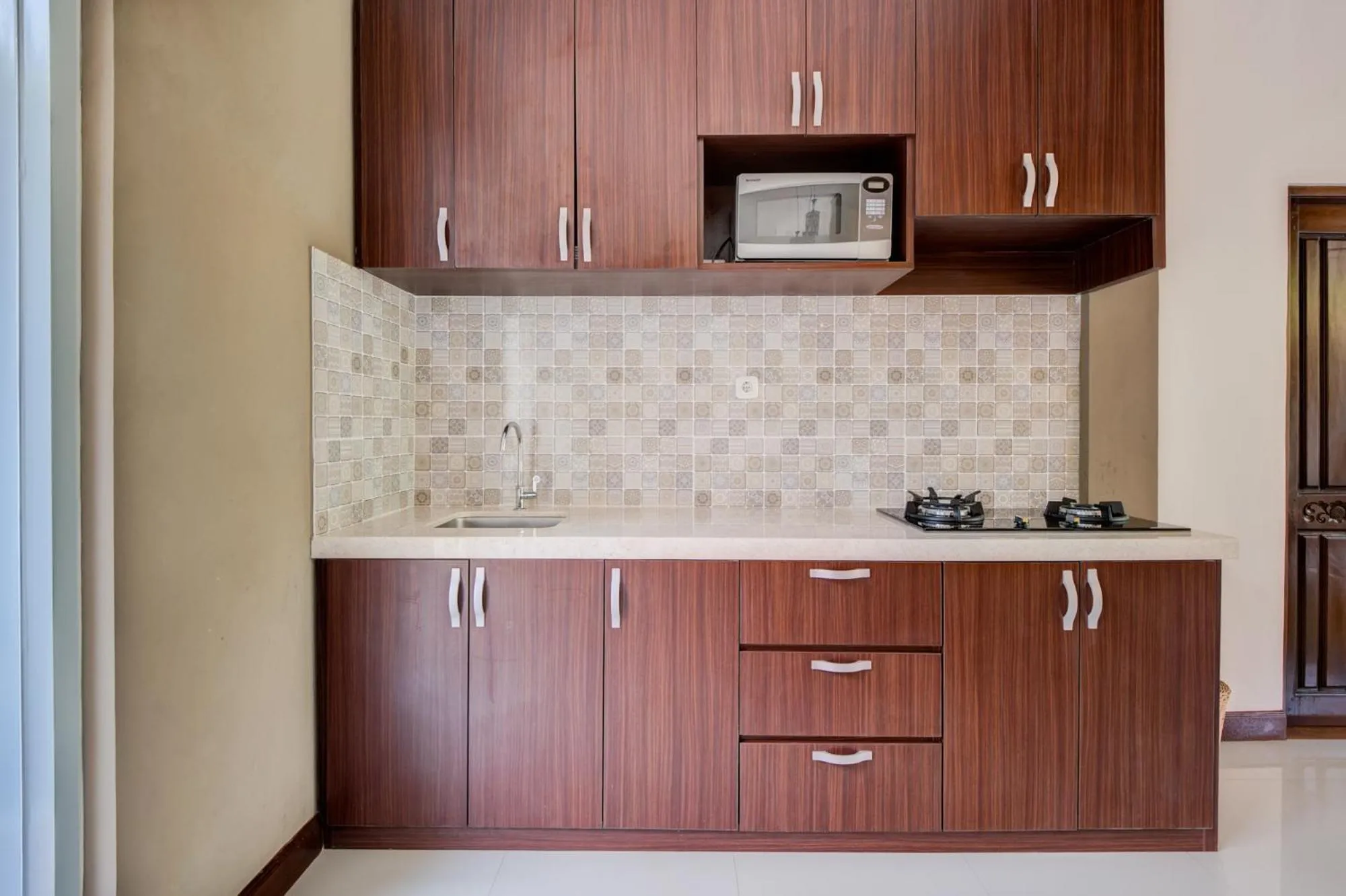 Kitchen or kitchenette in Gracia Bali Villas & Apartment Managed by Manara