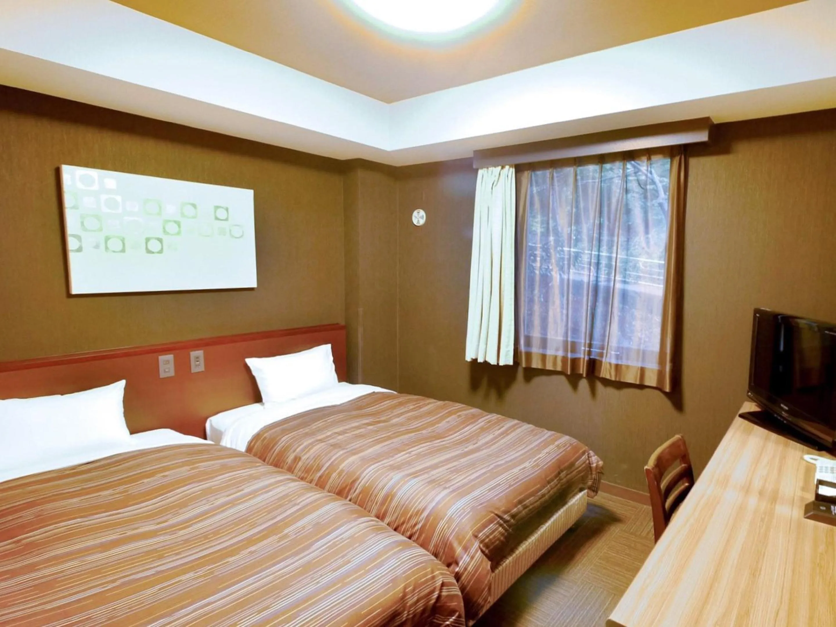 Photo of the whole room, Bed in Hotel Route-Inn Kawaguchiko