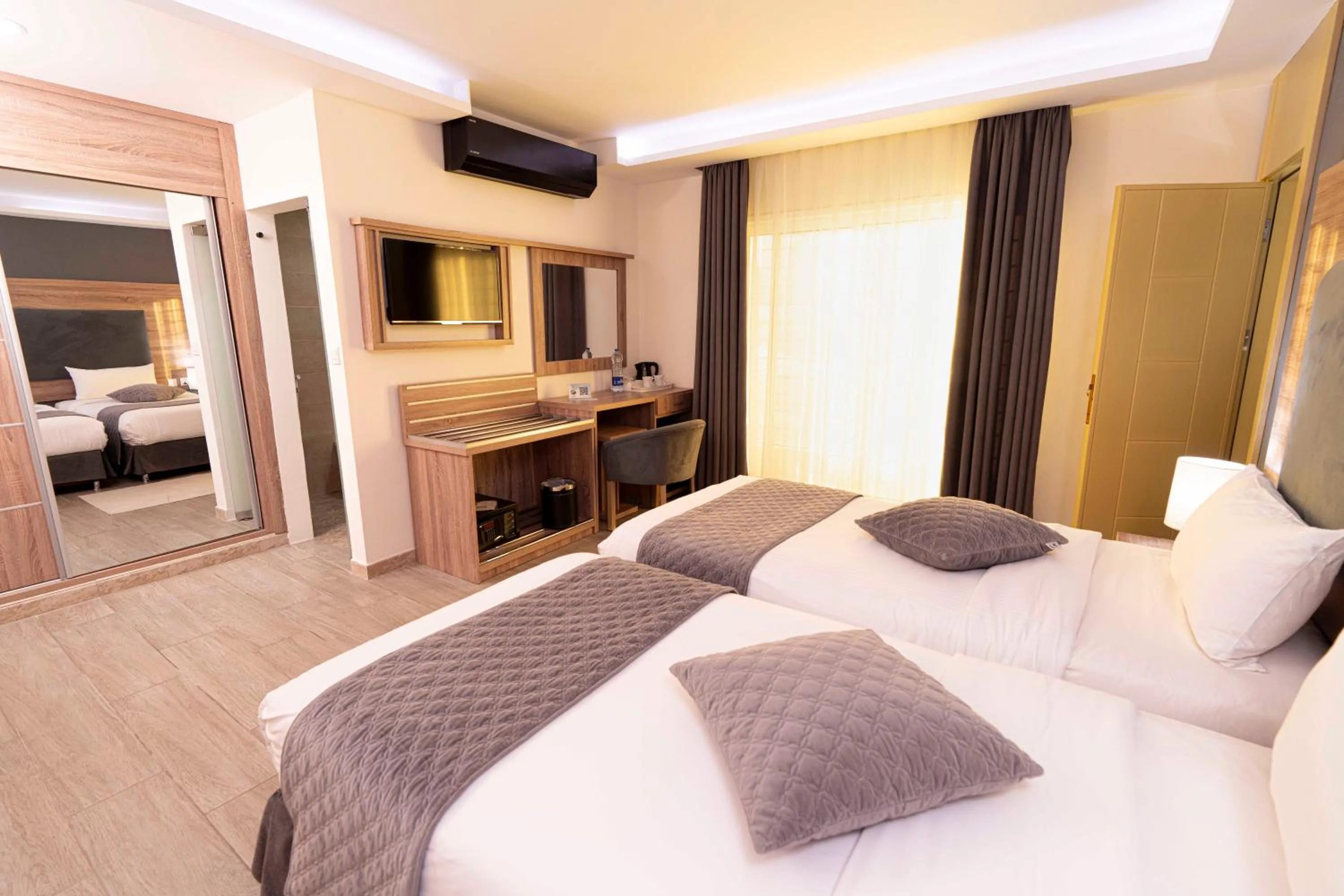 Bed in Petra Moon Hotel