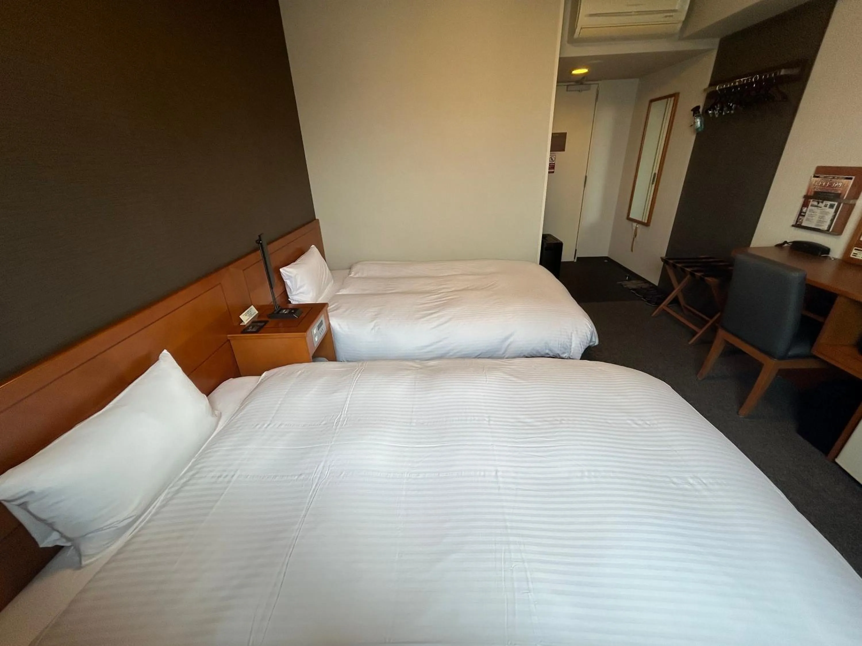 Photo of the whole room, Bed in Hotel Route-Inn Kanazawa Ekimae