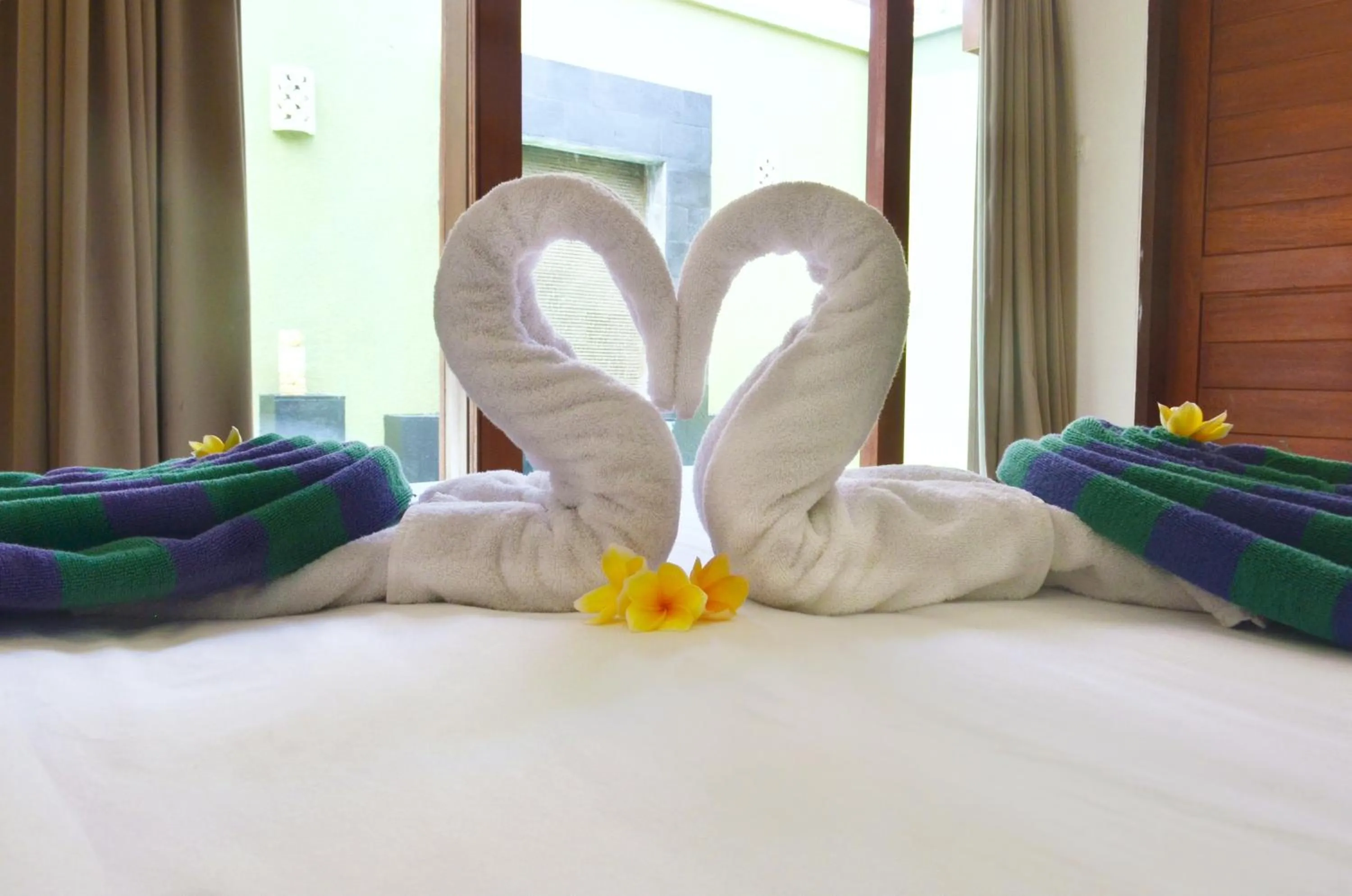 Bed in The Jas Villas