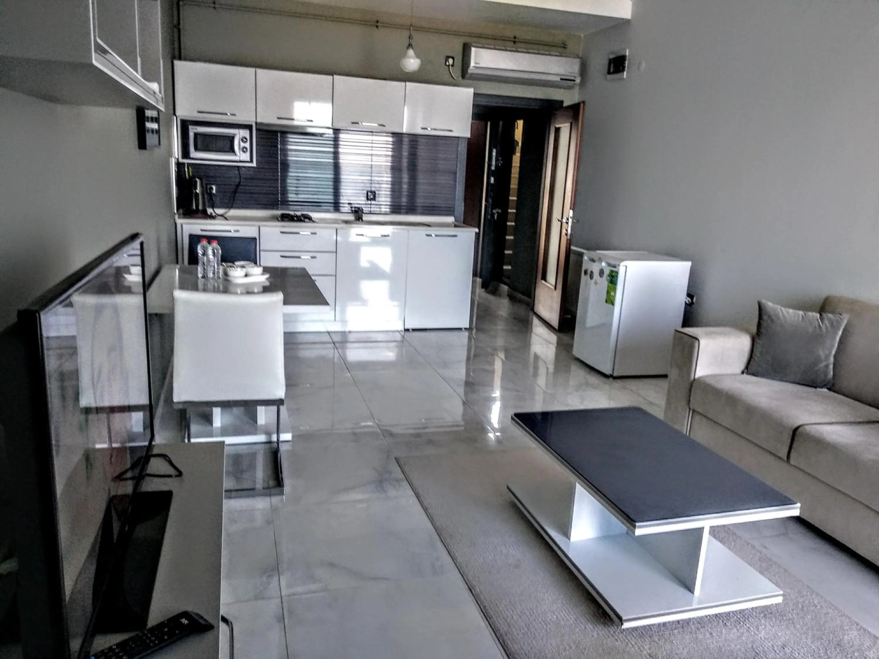 Kitchen or kitchenette in Güzel Yalı Evleri Residence &Apart Hotel