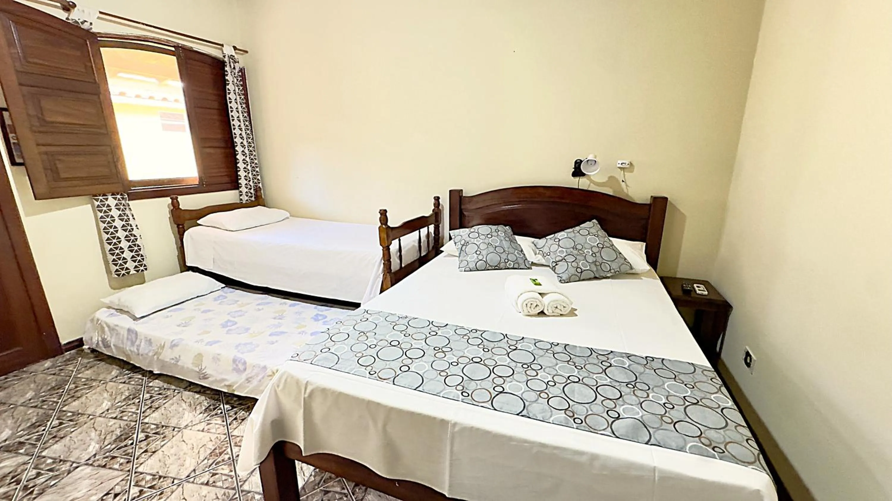 Bed in Pousada Parque Imperial no centro de Paraty