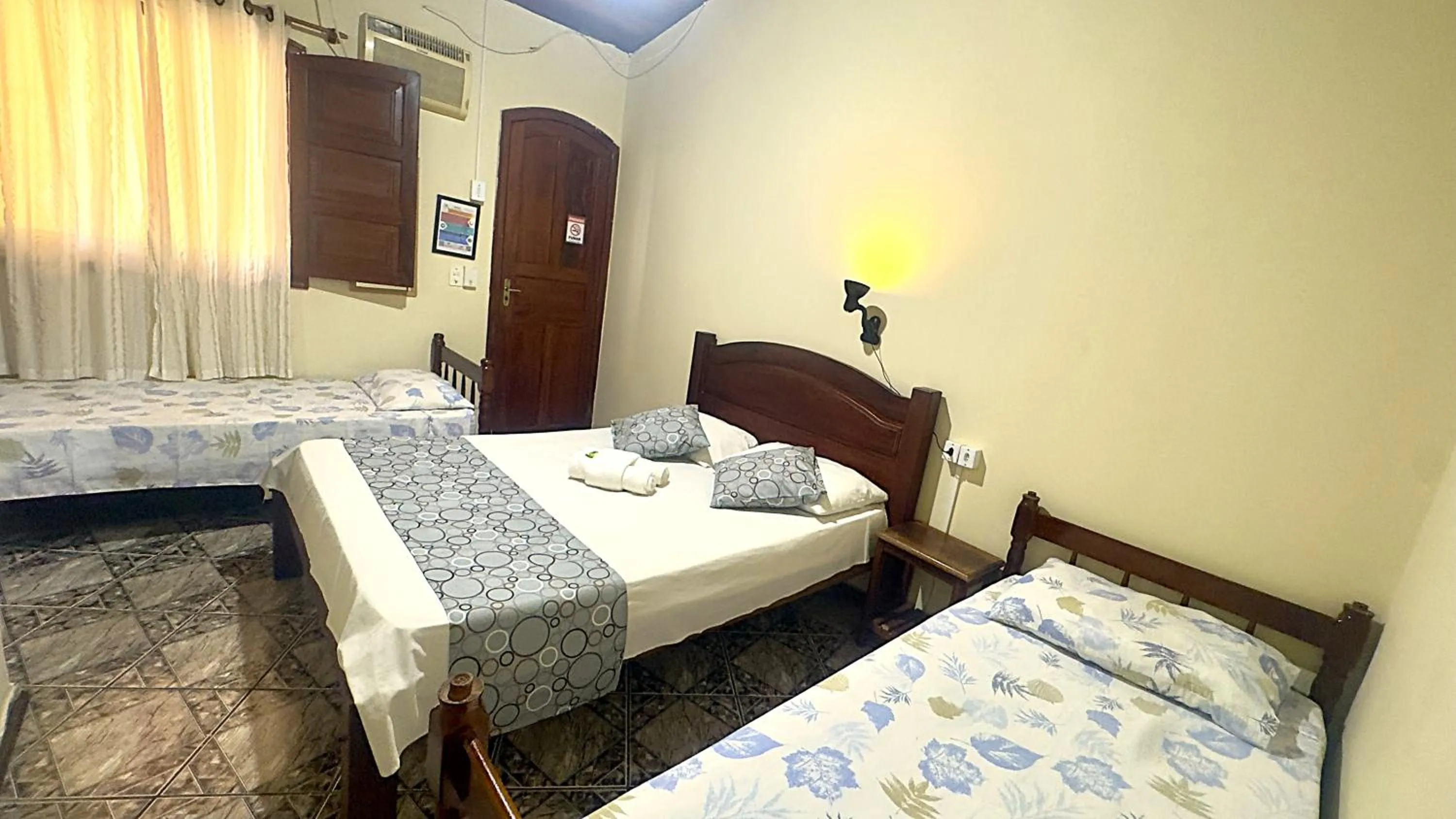 Bed in Pousada Parque Imperial no centro de Paraty