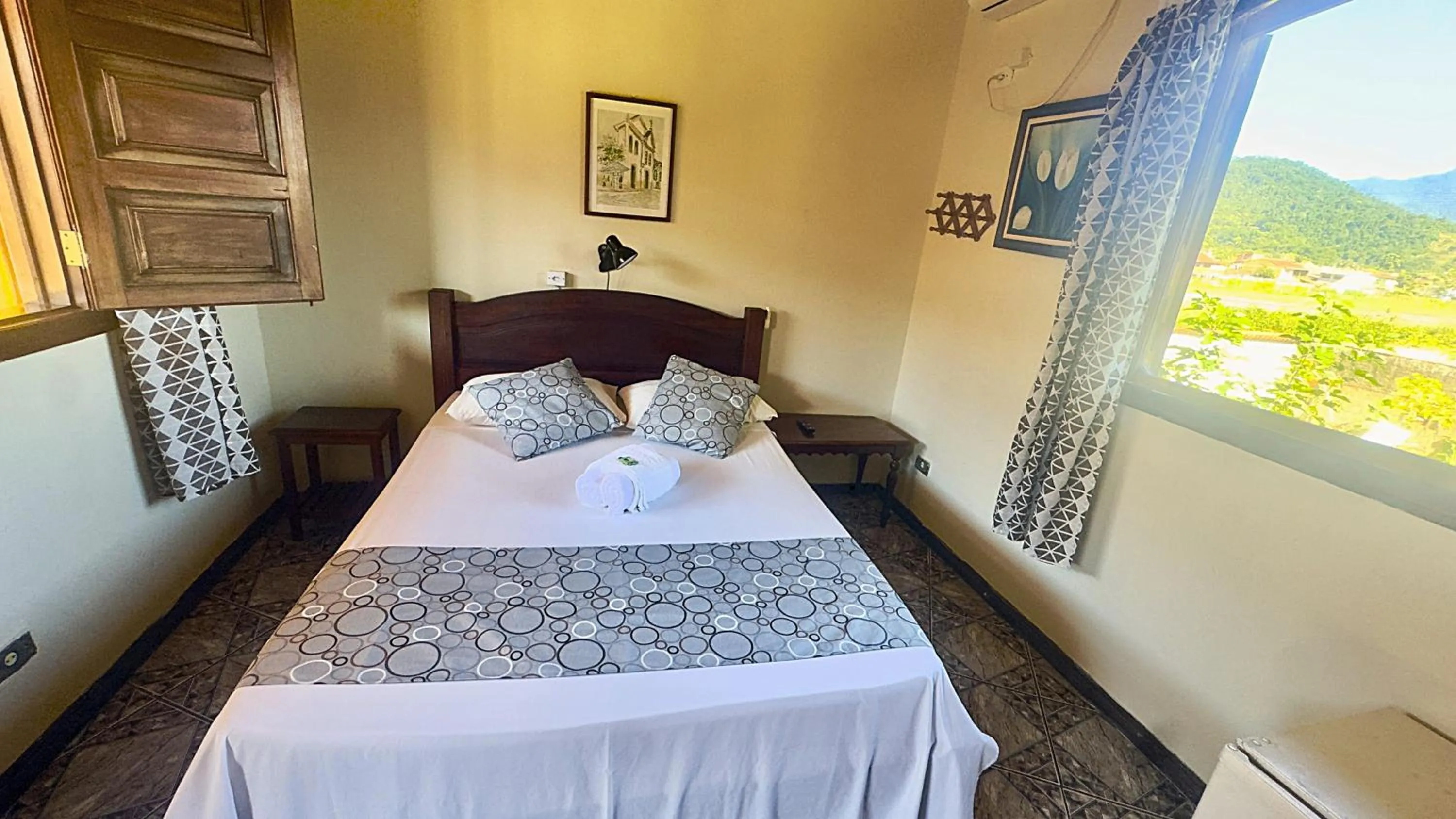 Bed in Pousada Parque Imperial no centro de Paraty