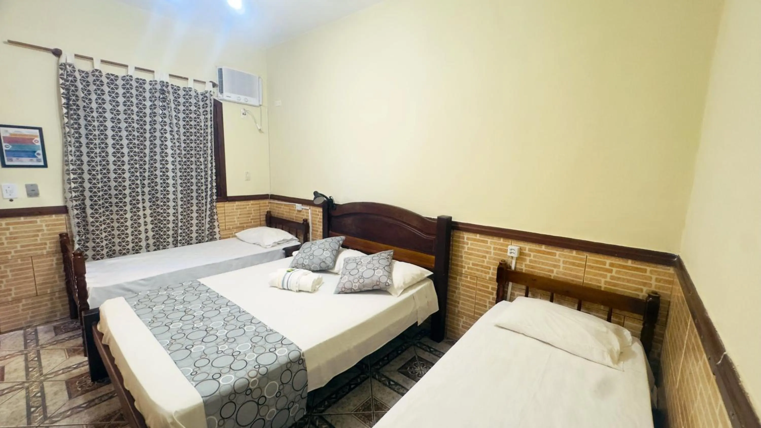 Bed in Pousada Parque Imperial no centro de Paraty