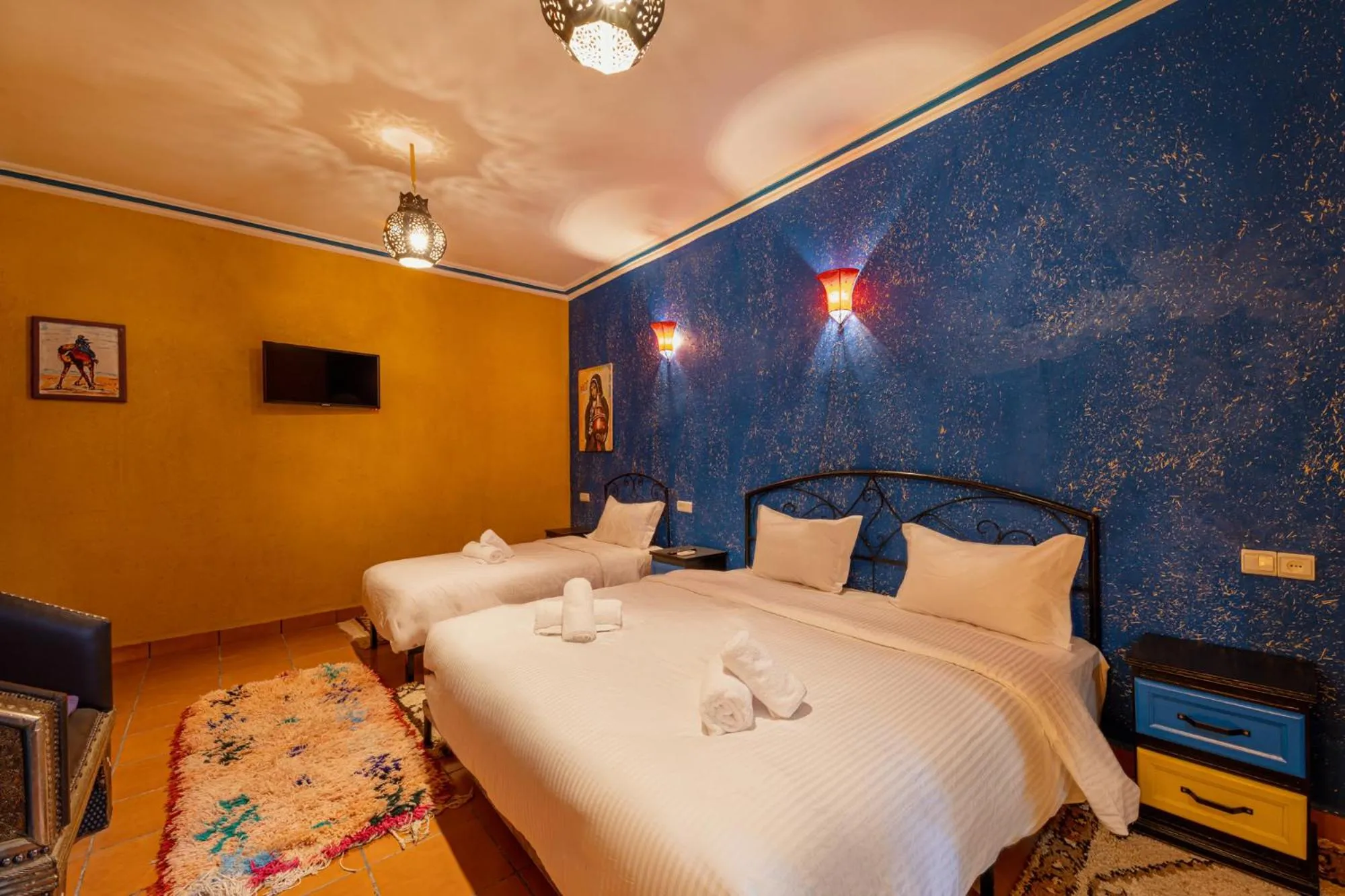 Bed in Kasbah Hotel Ziz Palace Rissani