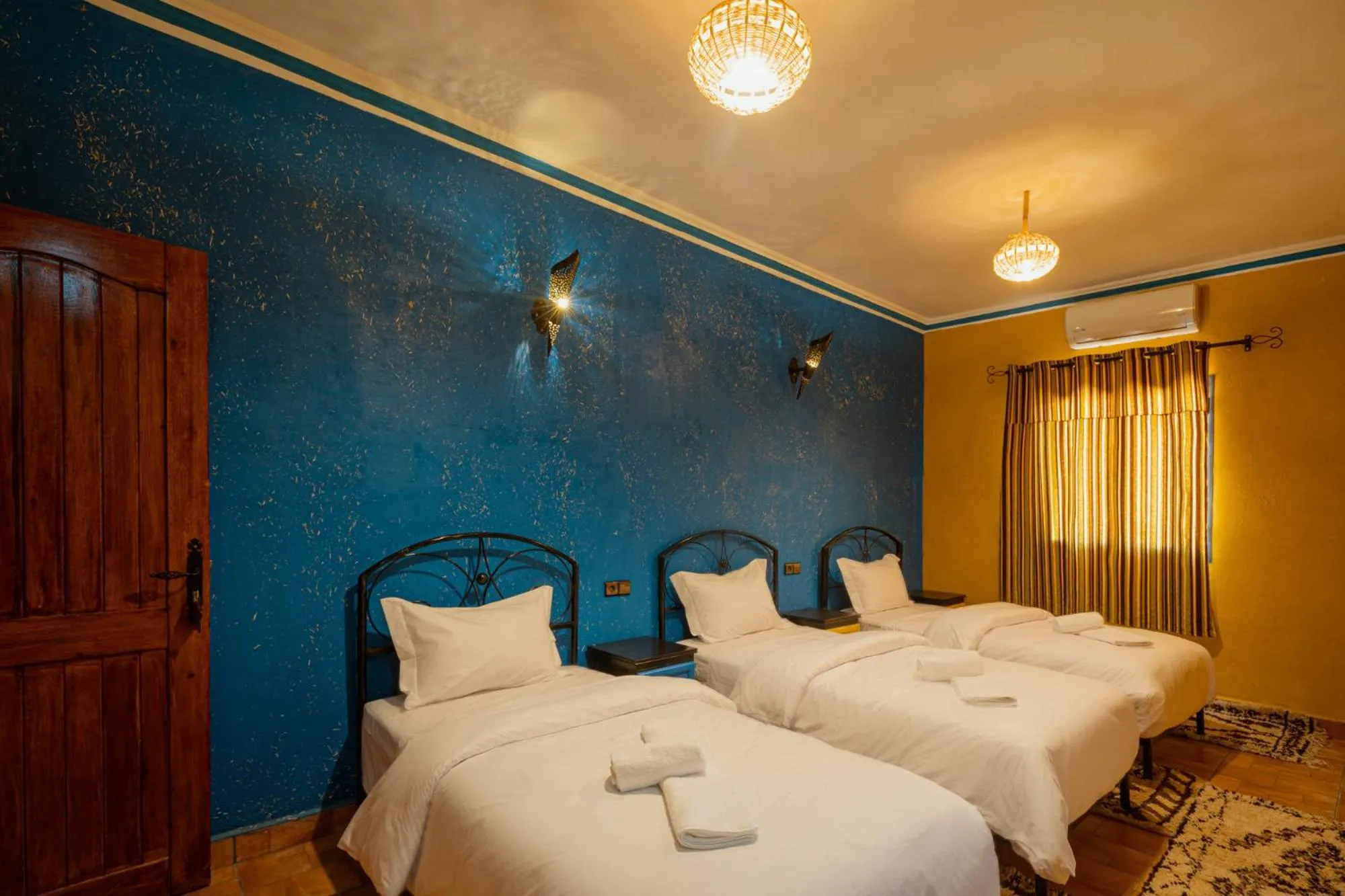 Bed in Kasbah Hotel Ziz Palace Rissani