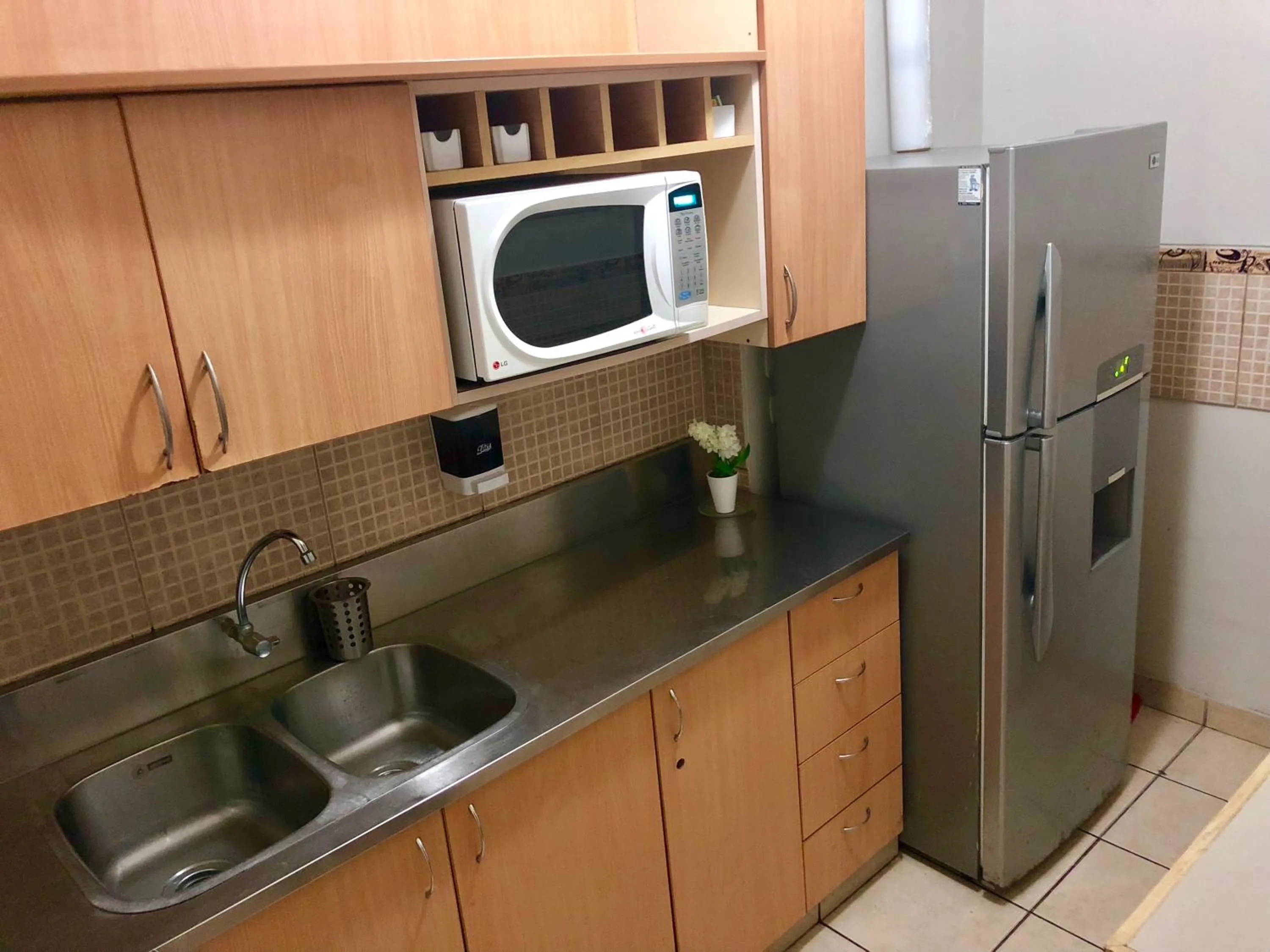 Kitchen or kitchenette in Imperial Inn Hospedaje Turistico