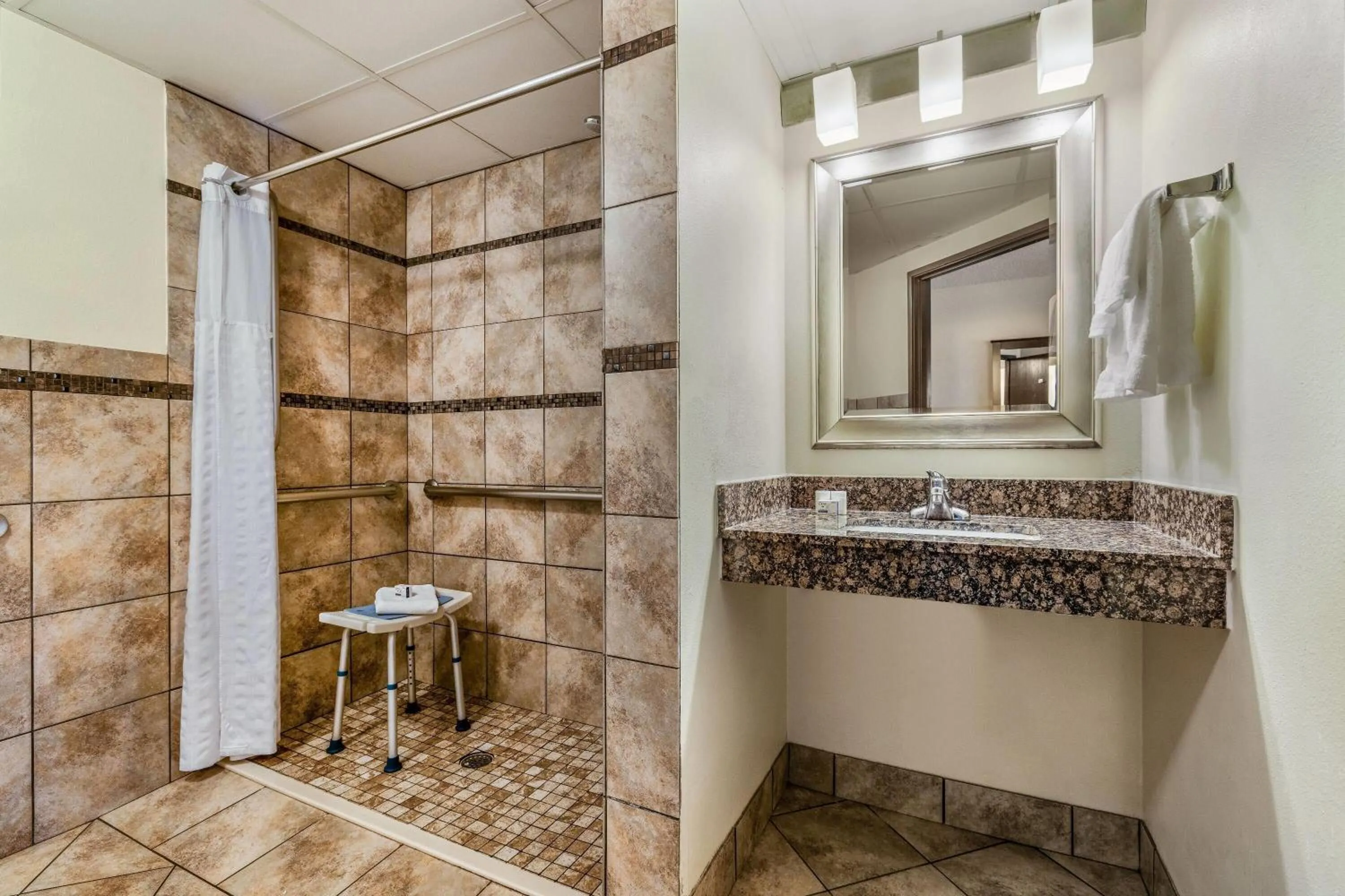 Shower in Baymont by Wyndham Bloomington MSP Airport