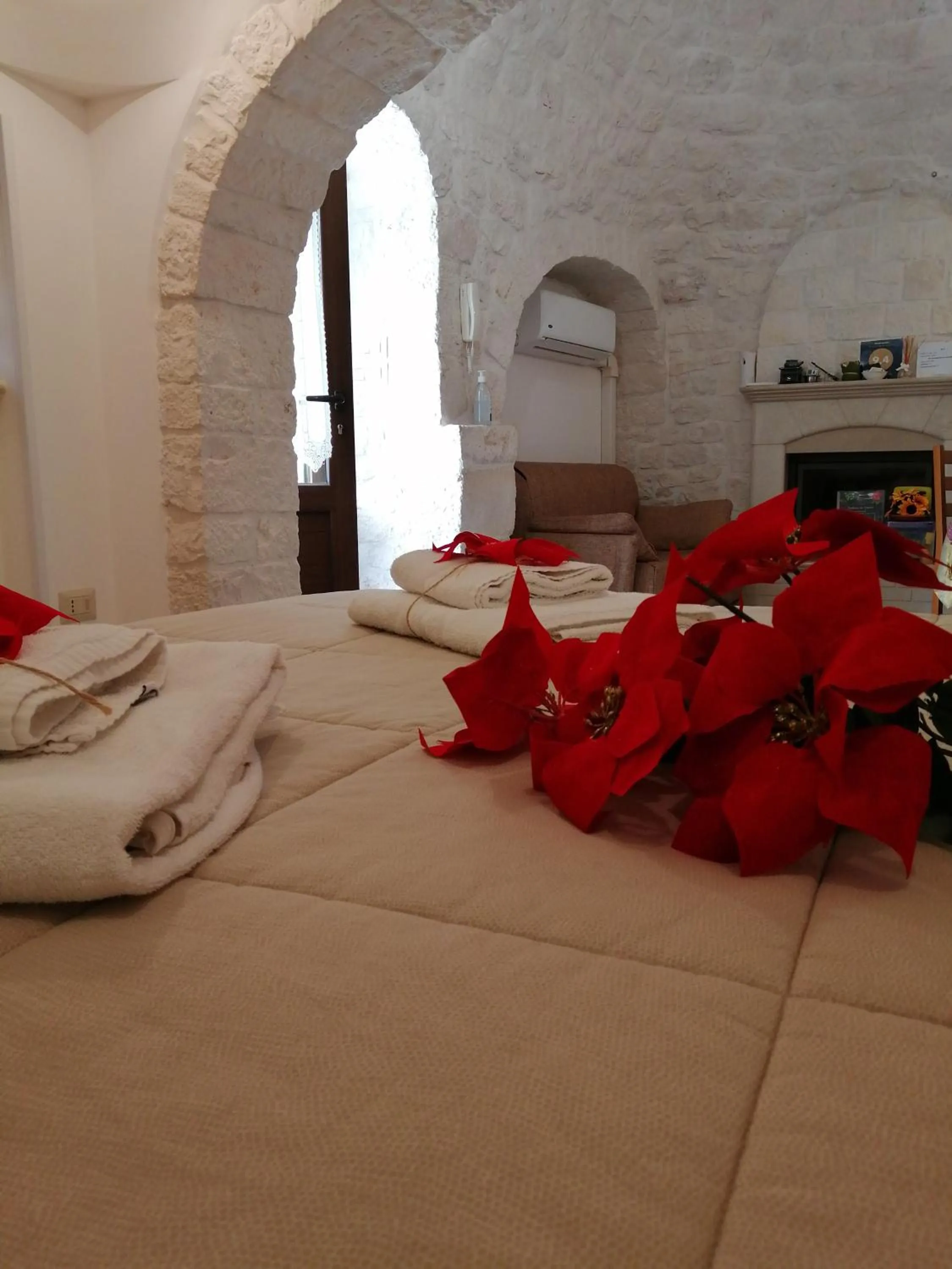 towels, Bed in Trulli dell'aia