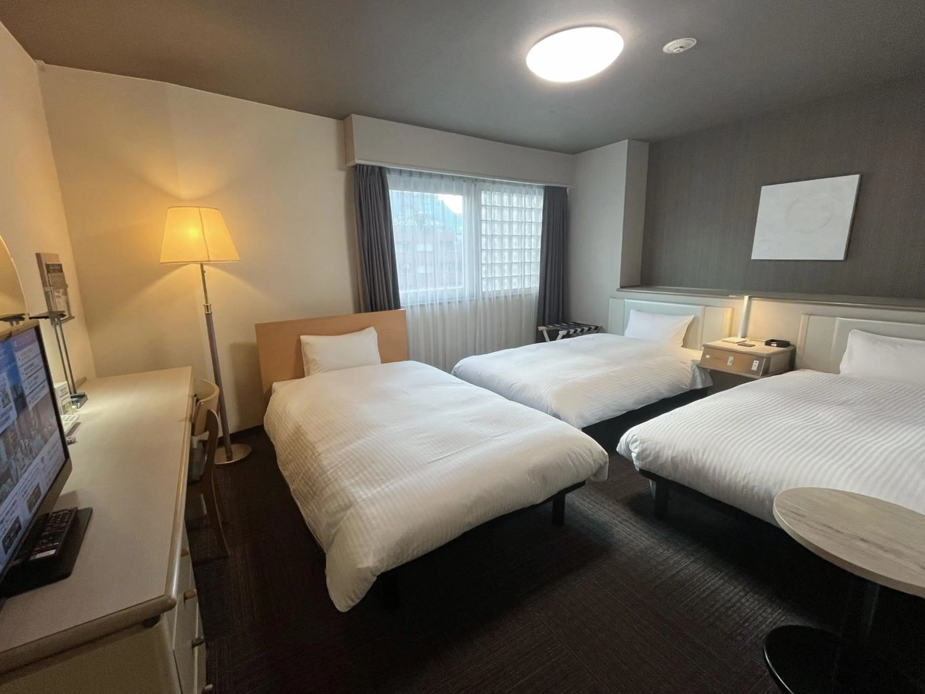 Photo of the whole room, Bed in Hotel Route-Inn Tokyo Ikebukuro