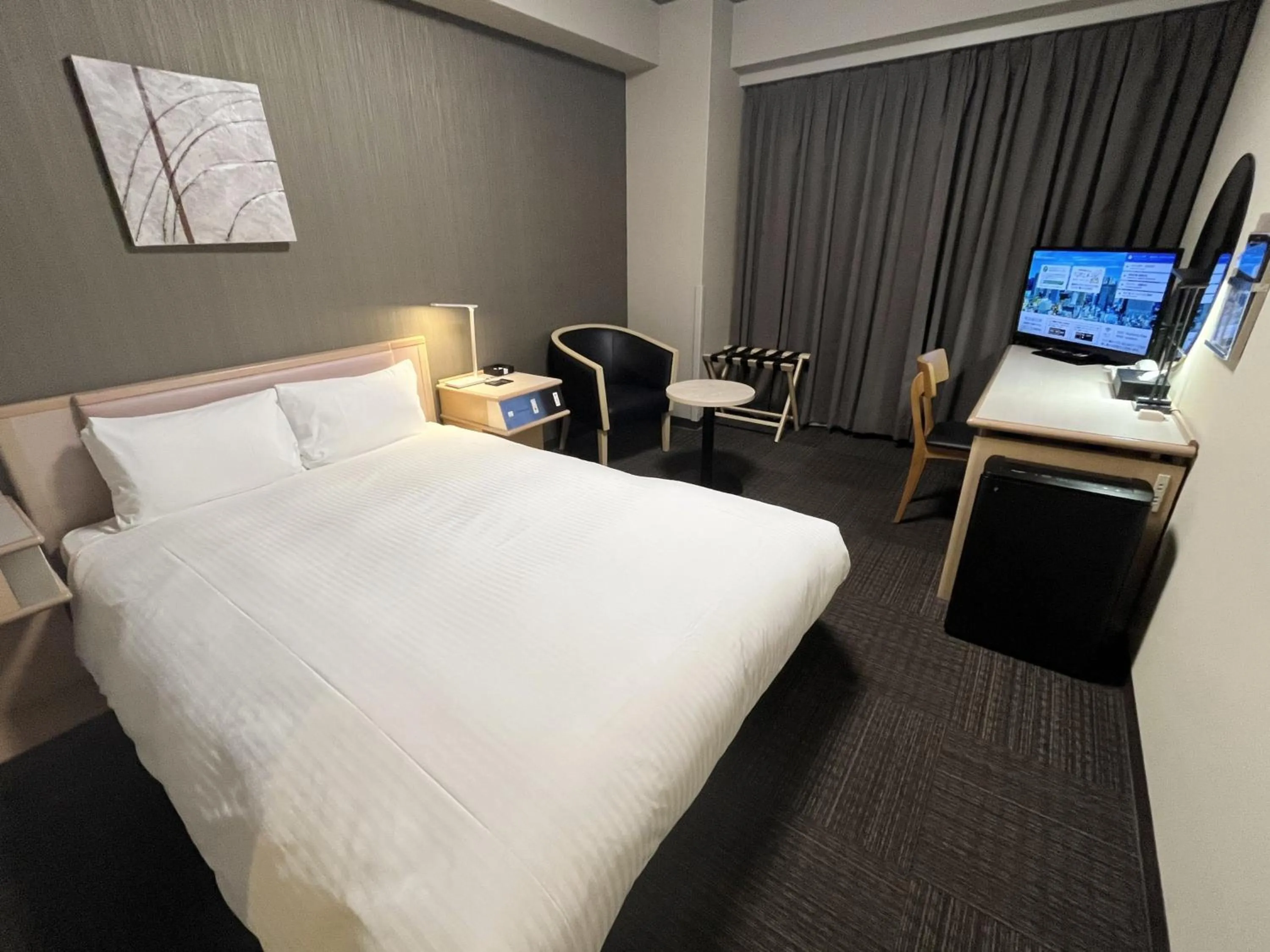 Photo of the whole room, Bed in Hotel Route-Inn Tokyo Ikebukuro