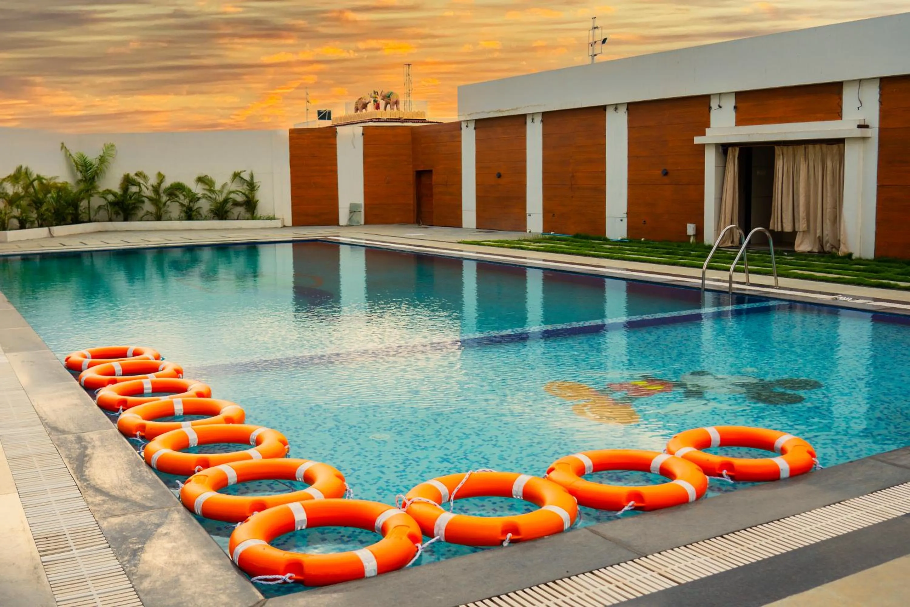 Swimming pool in Regenta Central Somnath, Bhalpara