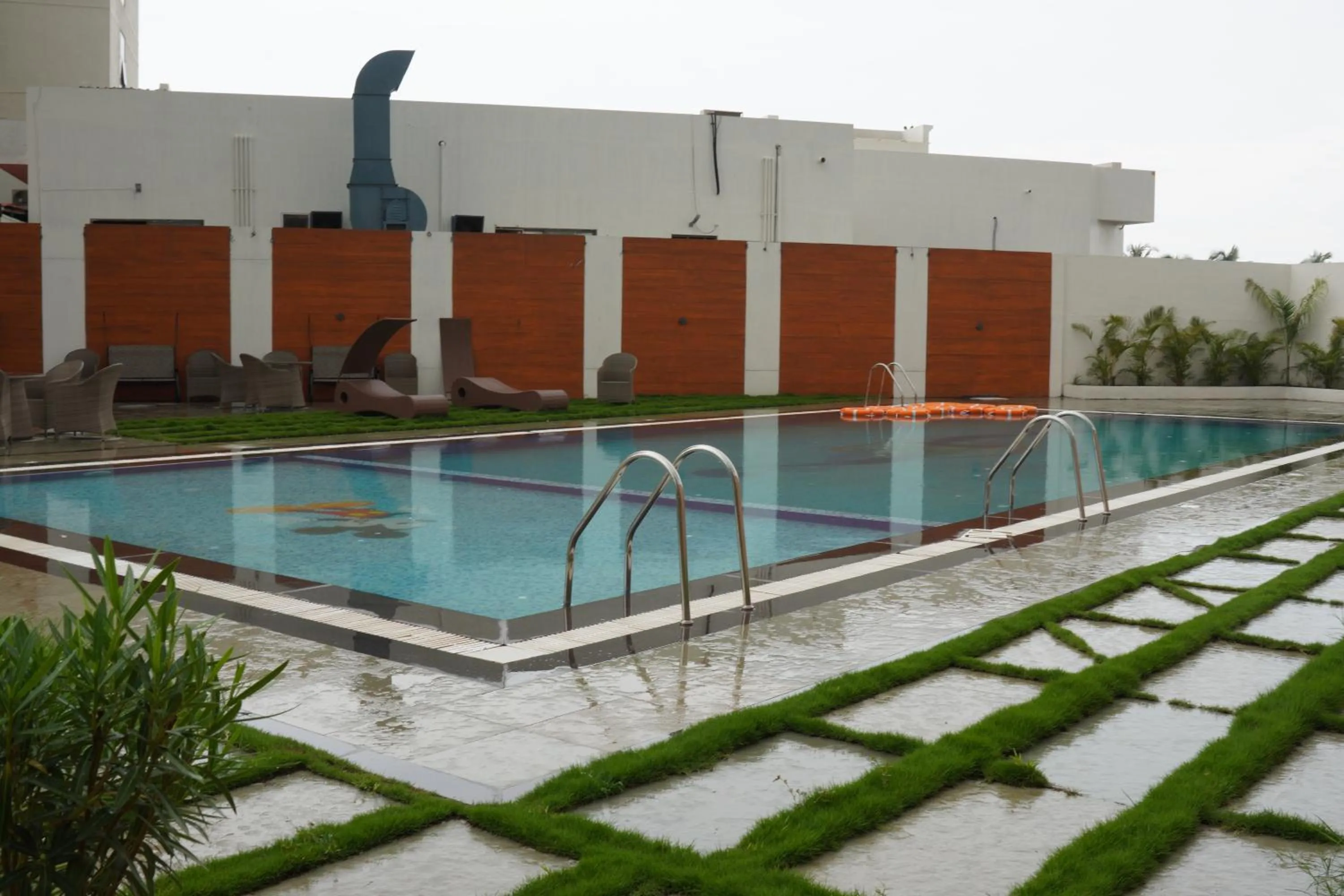 Swimming pool in Regenta Central Somnath, Bhalpara