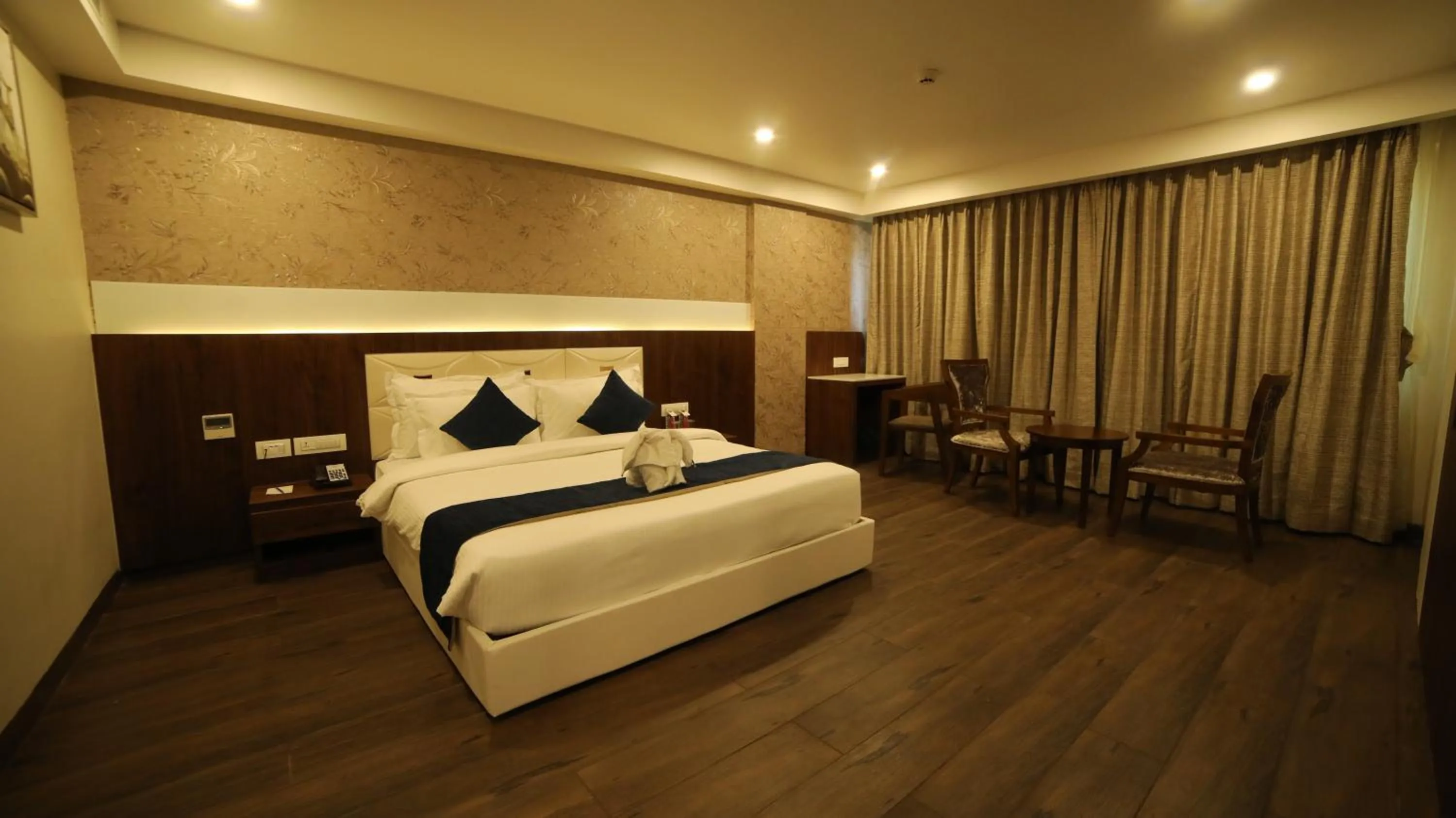 Bedroom, Bed in Regenta Central Somnath, Bhalpara