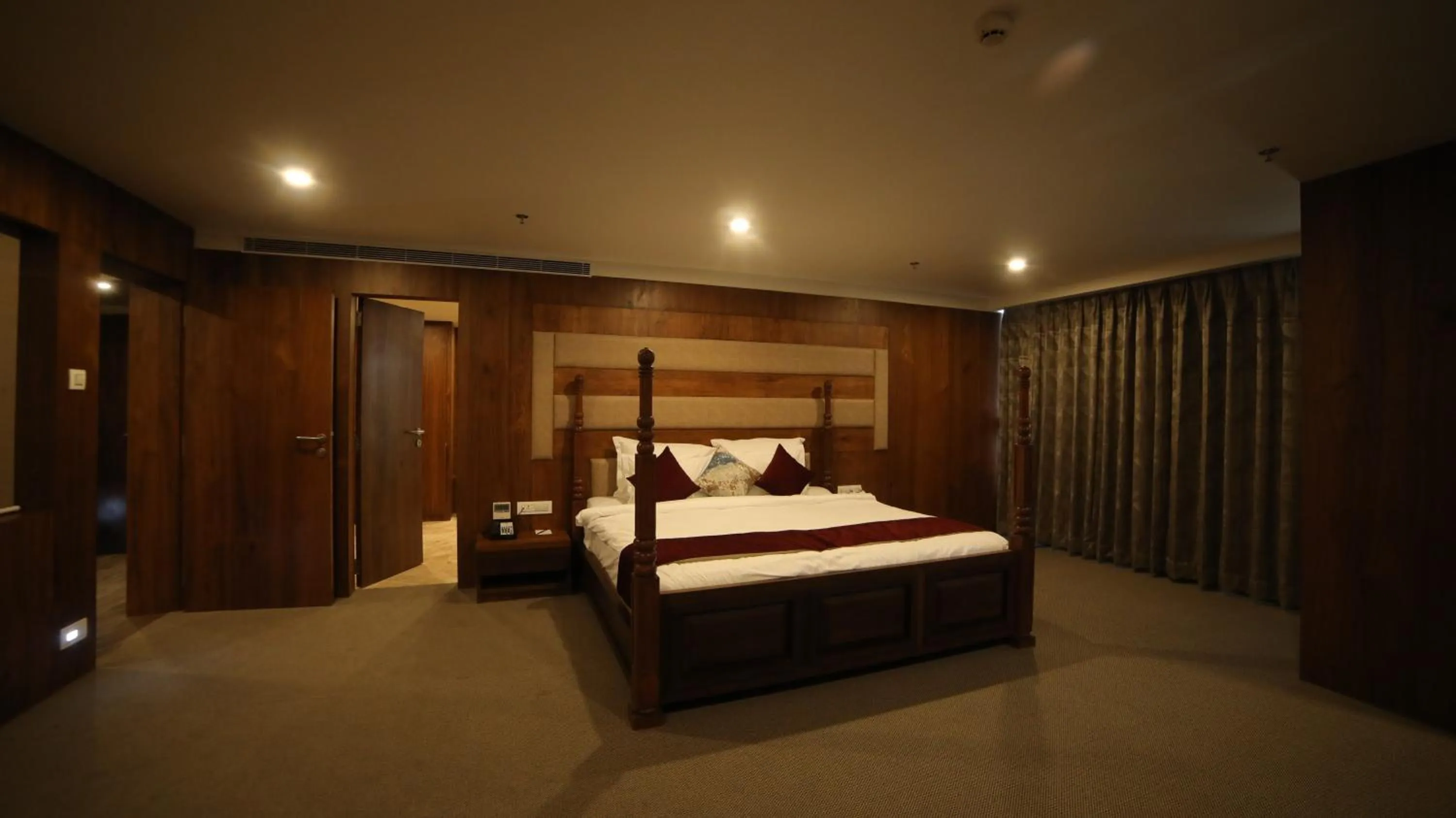 Bedroom, Bed in Regenta Central Somnath, Bhalpara
