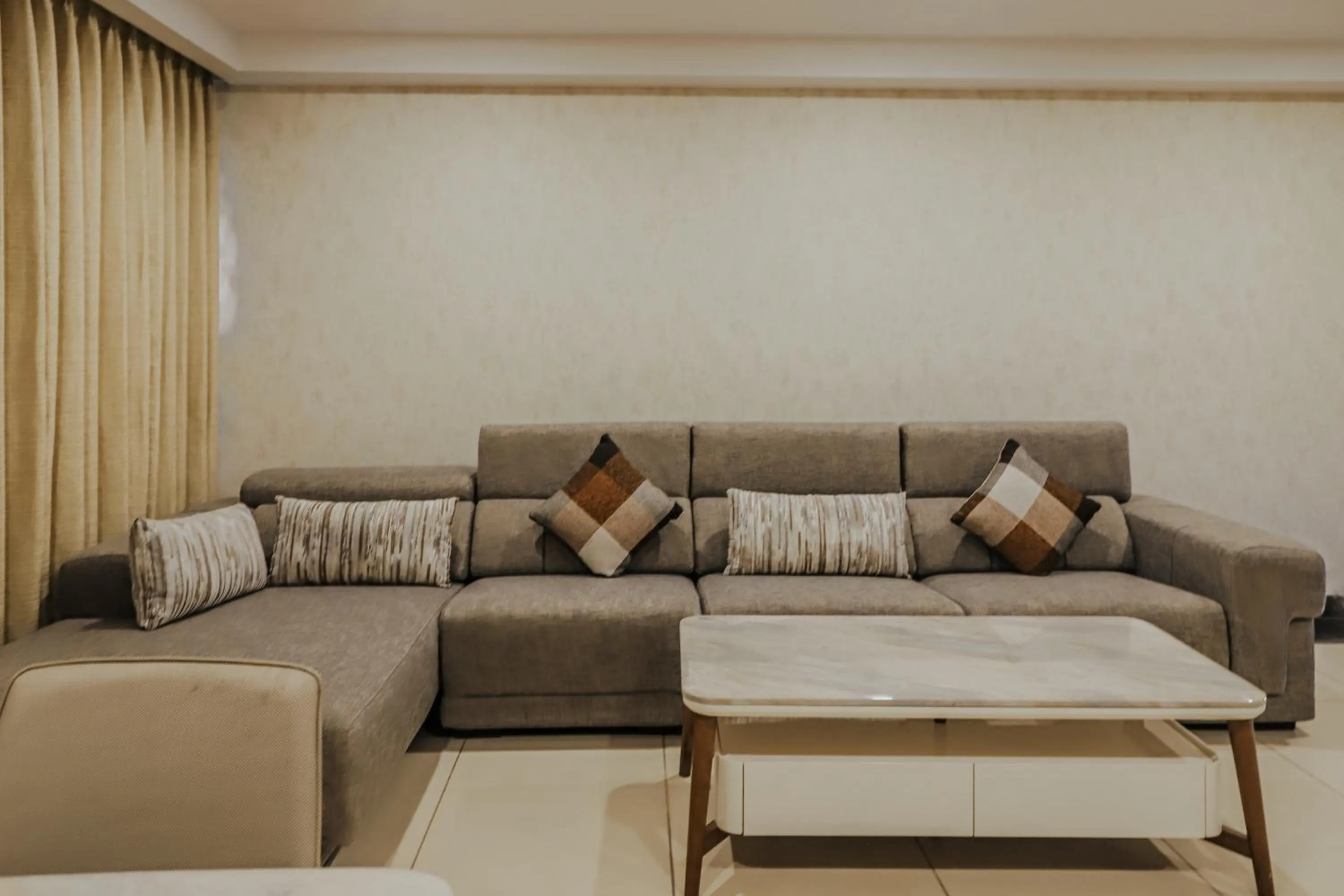 Living room in Regenta Central Somnath, Bhalpara