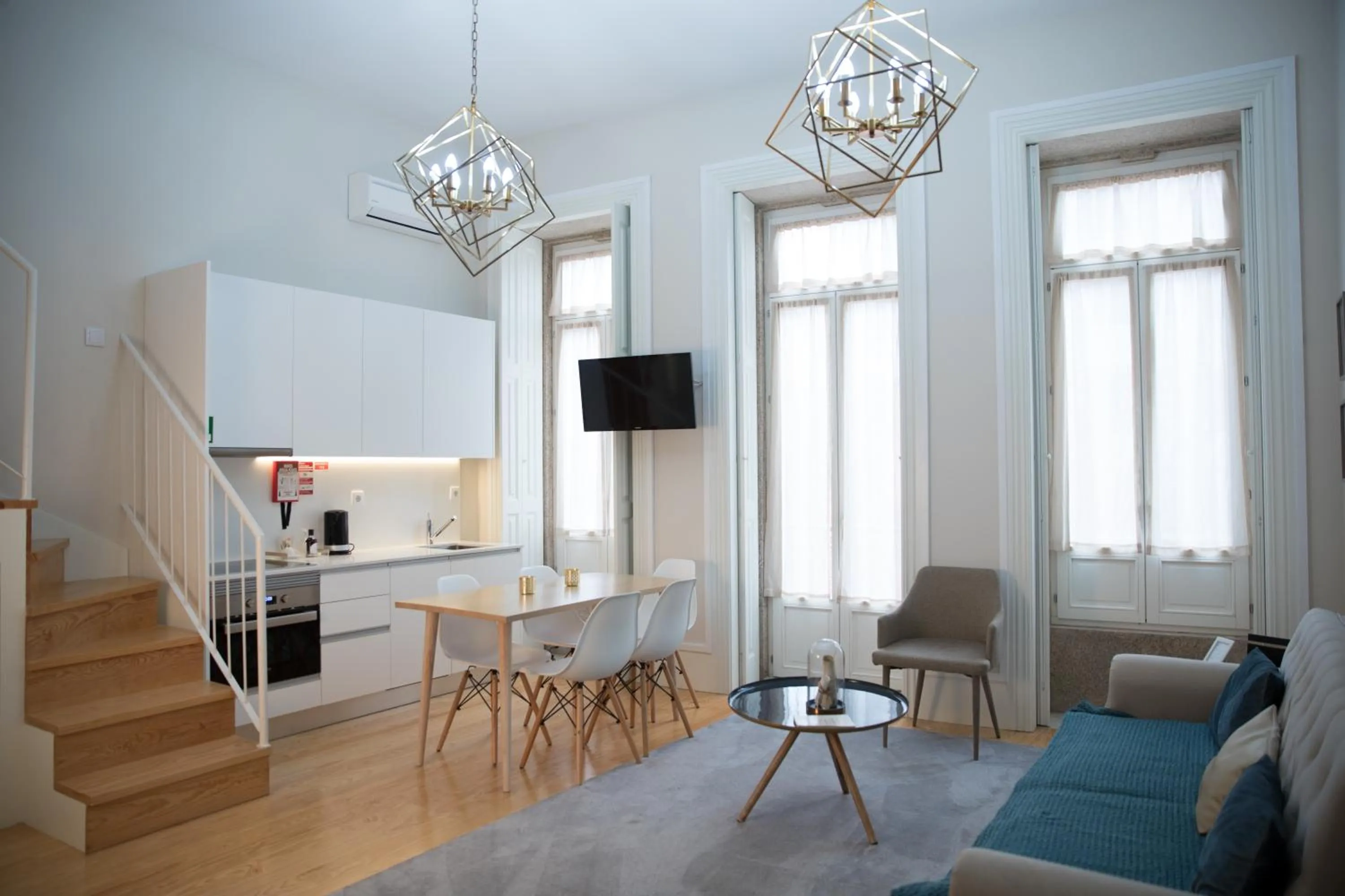 Communal lounge/ TV room in Mercado dos Poetas – Tourism Apartments