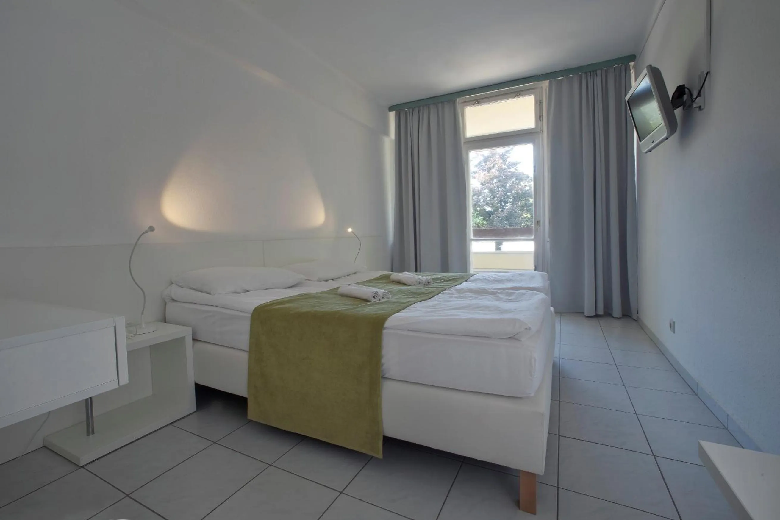 Bed in Hotel Holiday Csopak