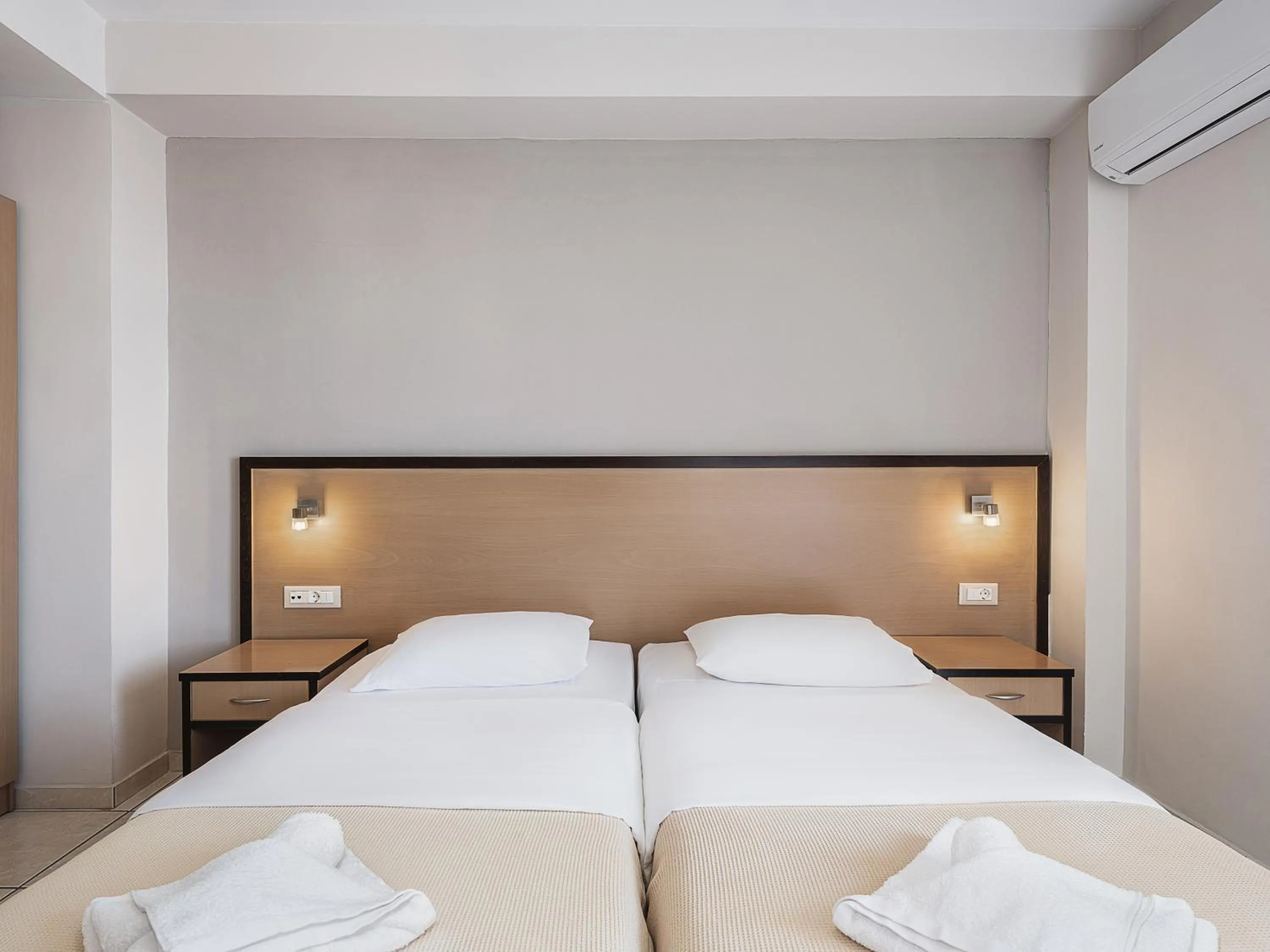 Bed in Theofilos City Hotel