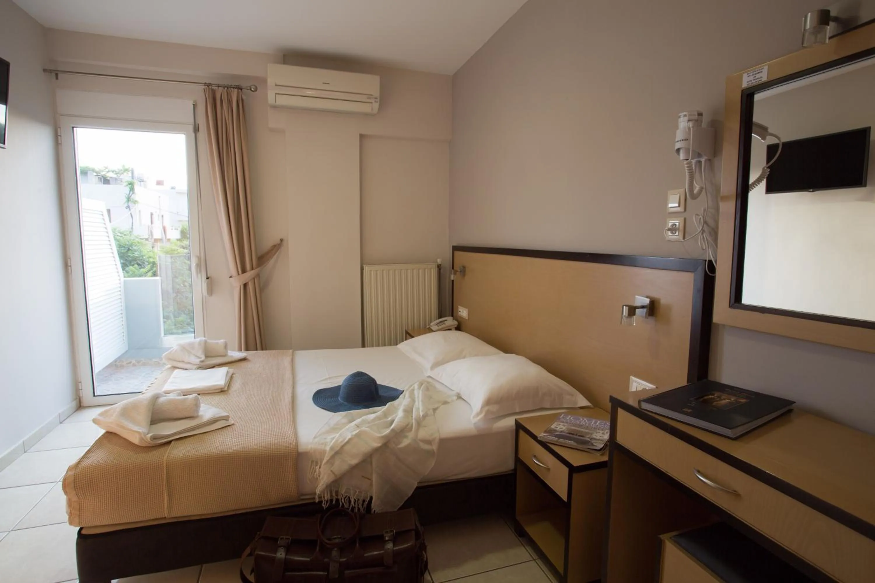 Photo of the whole room in Theofilos City Hotel