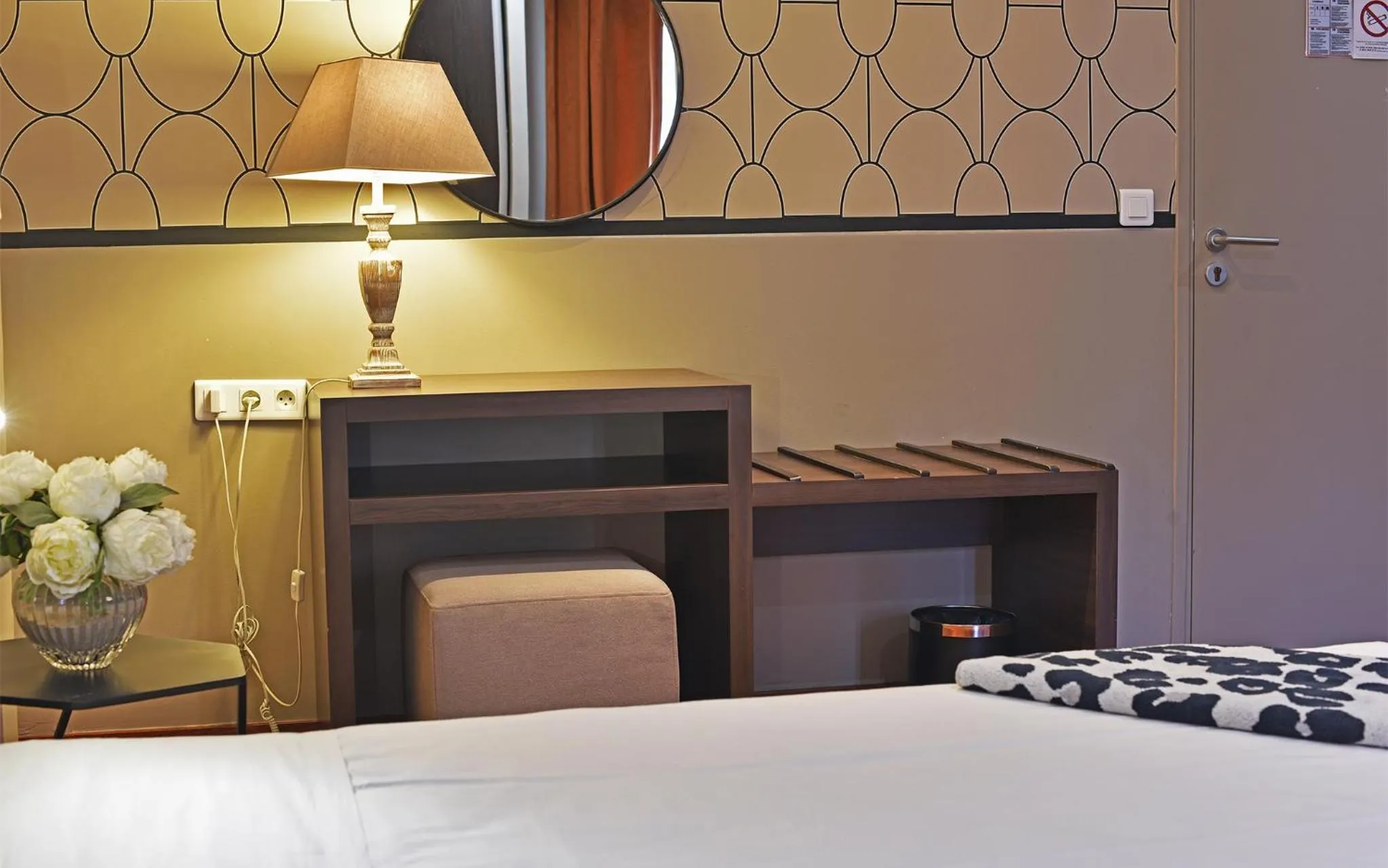 Decorative detail, Bed in Hotel Restaurant Christophe Colomb