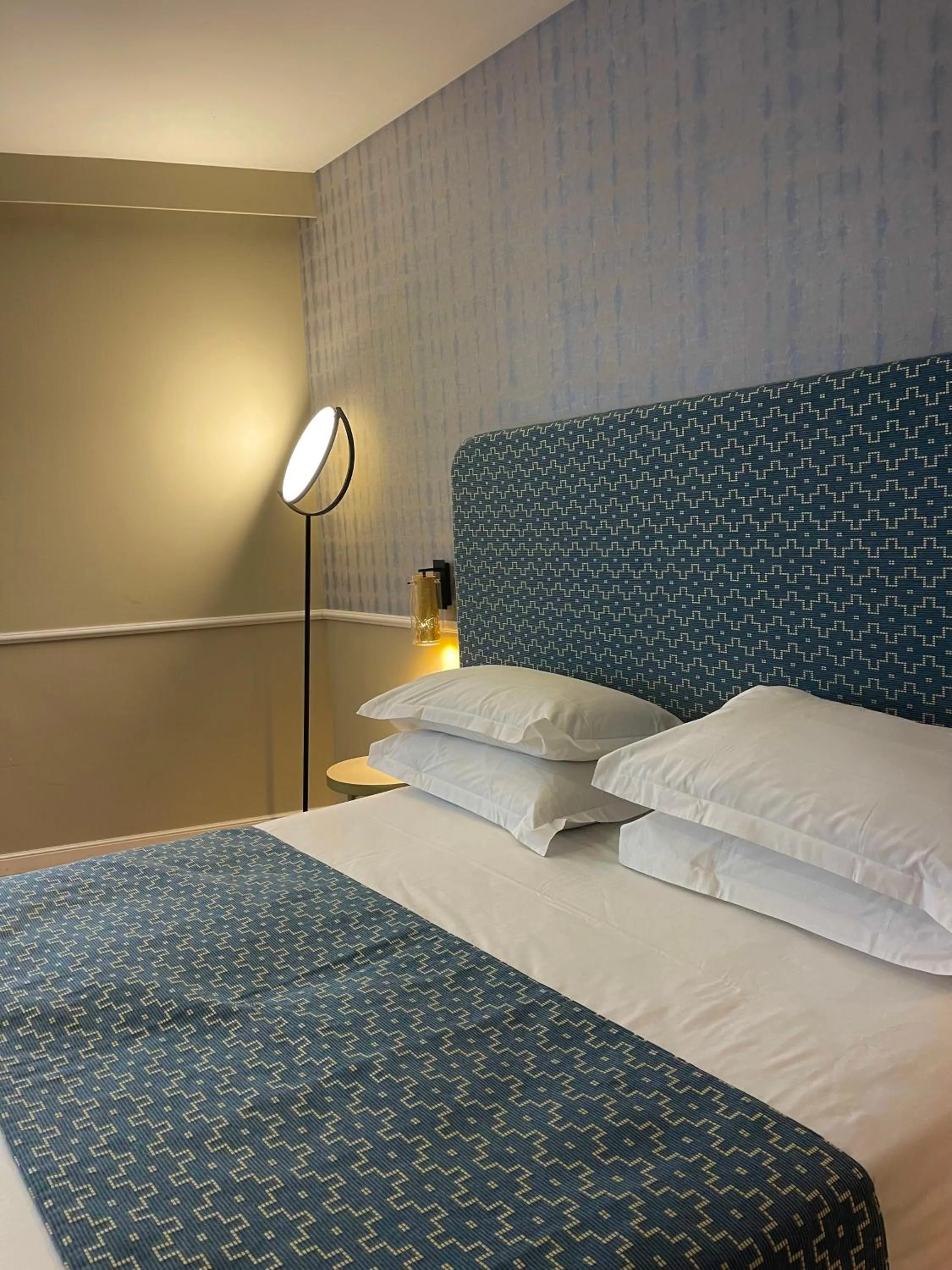 Bed in Hotel Restaurant Christophe Colomb