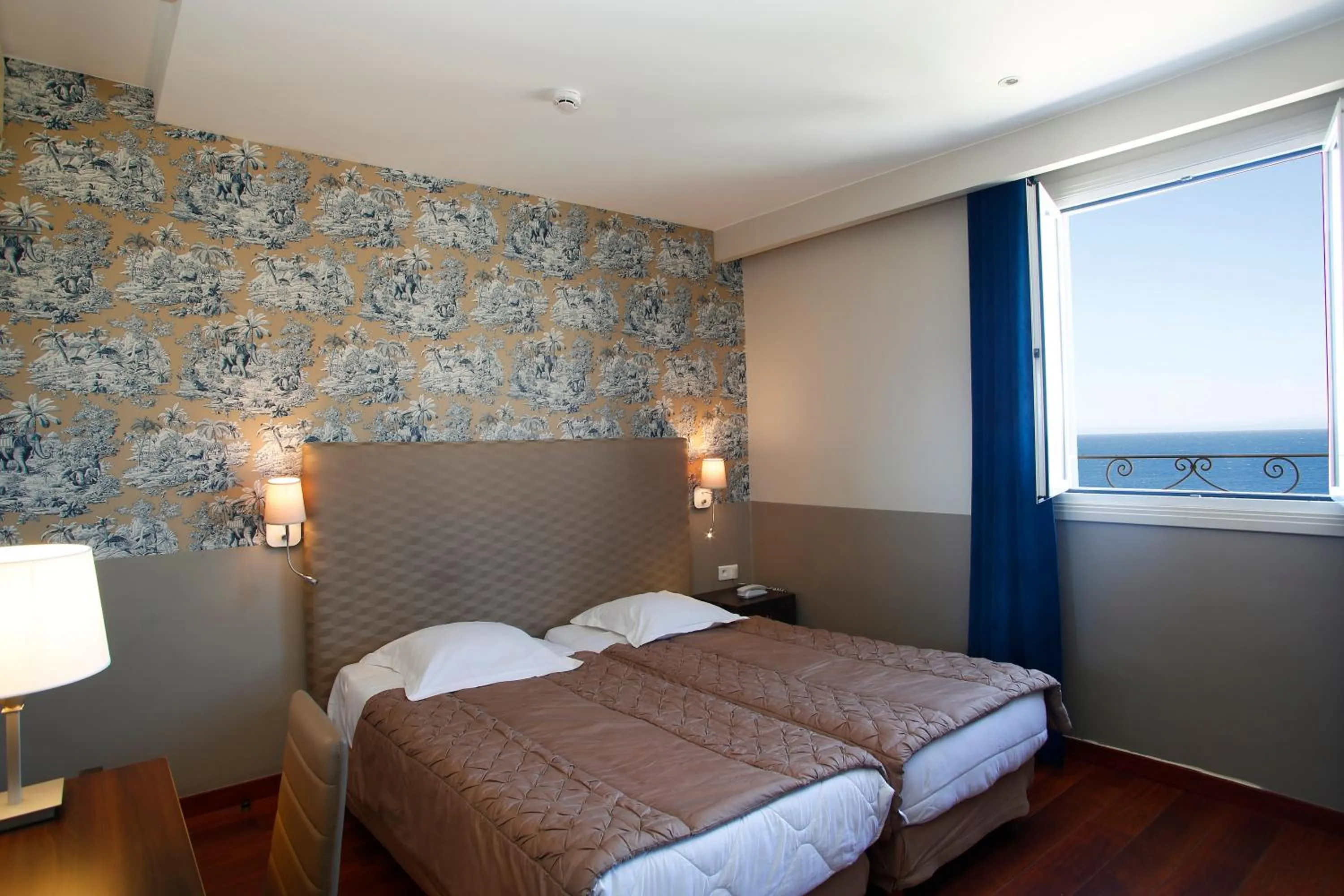 Bed in Hotel Restaurant Christophe Colomb