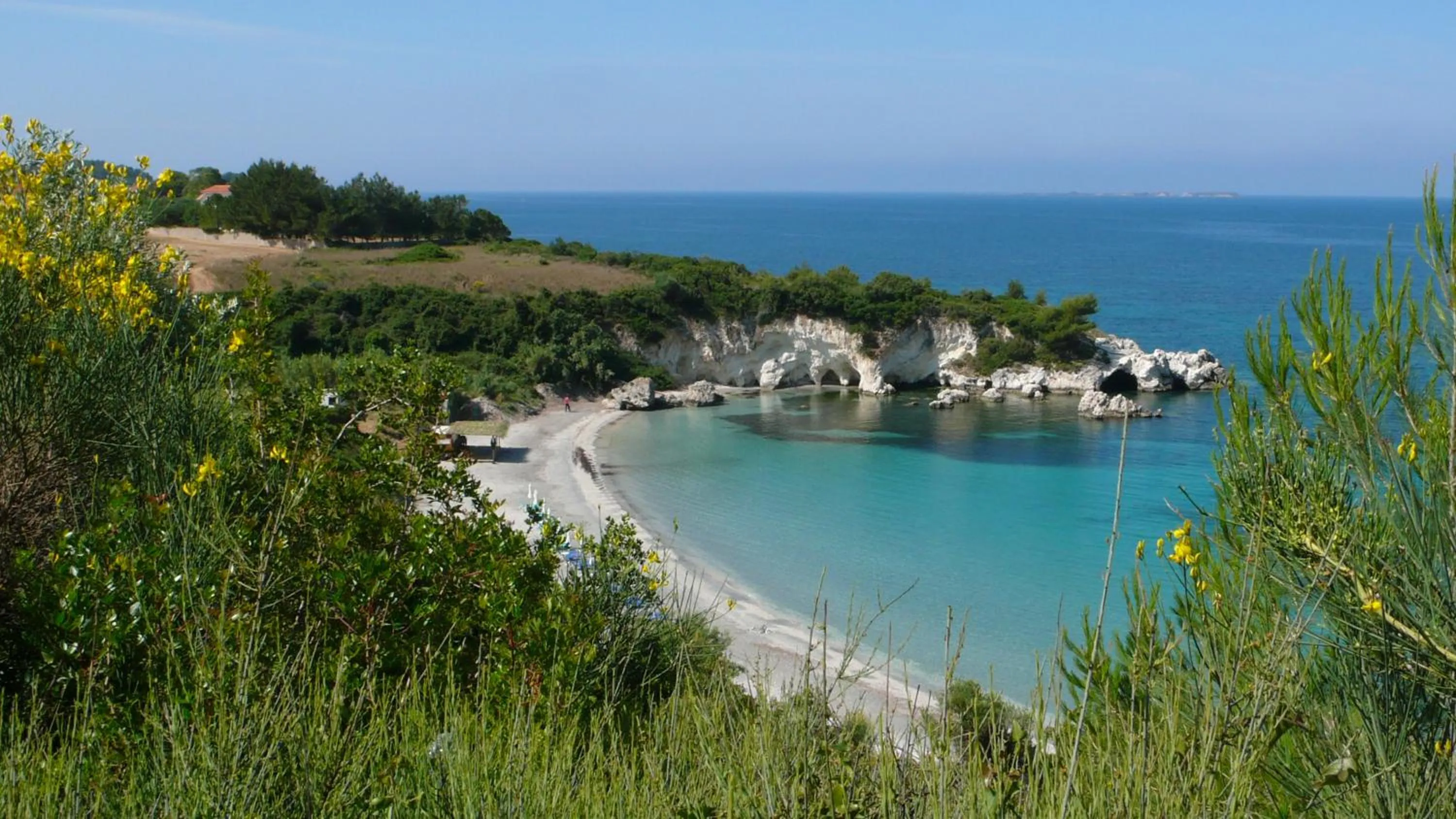 Beach in Oskars Studios & Apartments