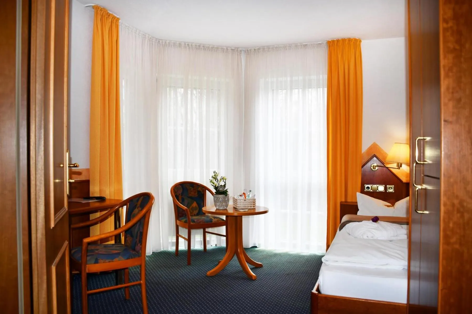 Seating area, Bed in Hotel Schöne Aussicht