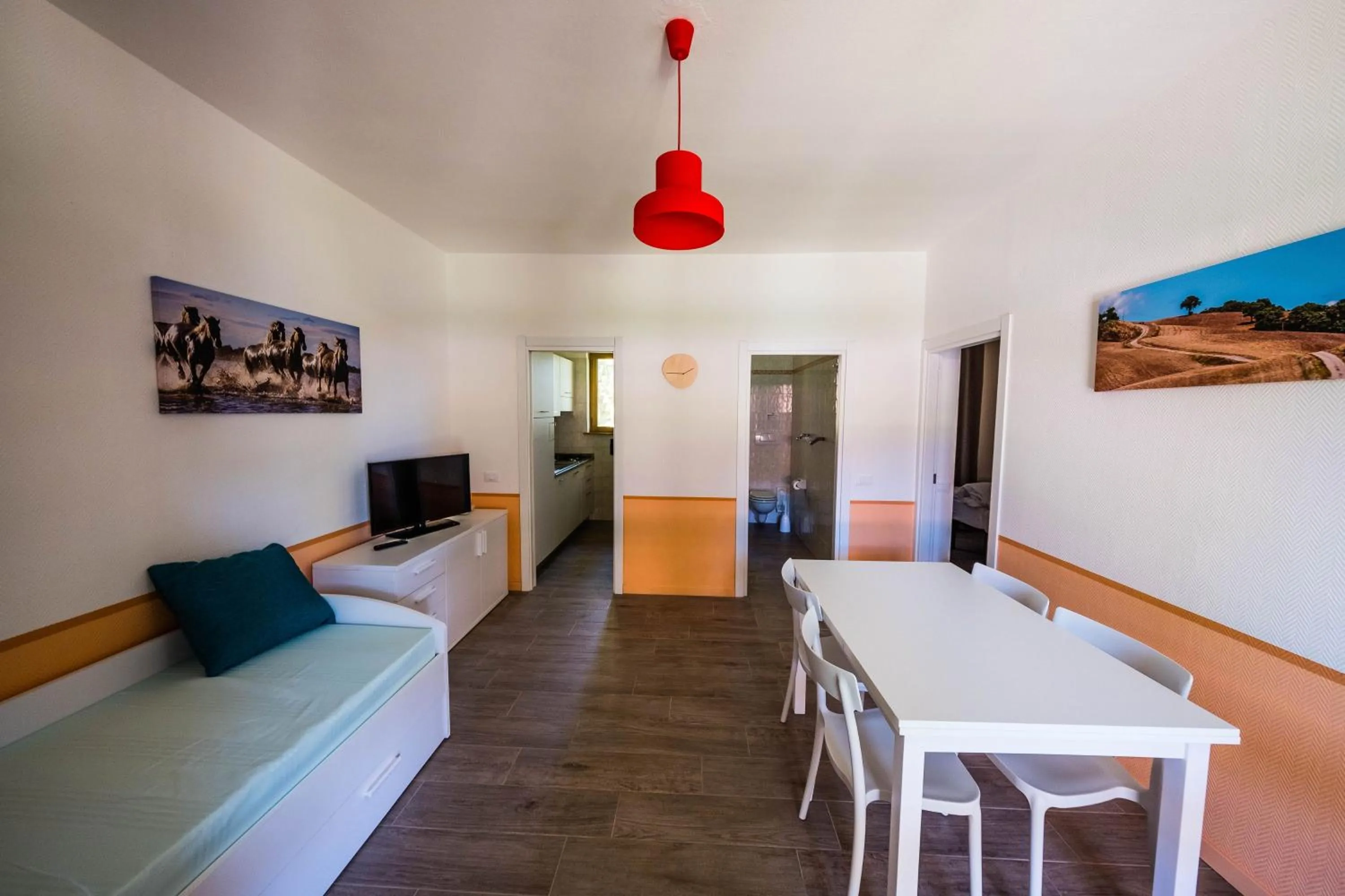 Bed in Golfo del Sole Hotel & Holiday Resort