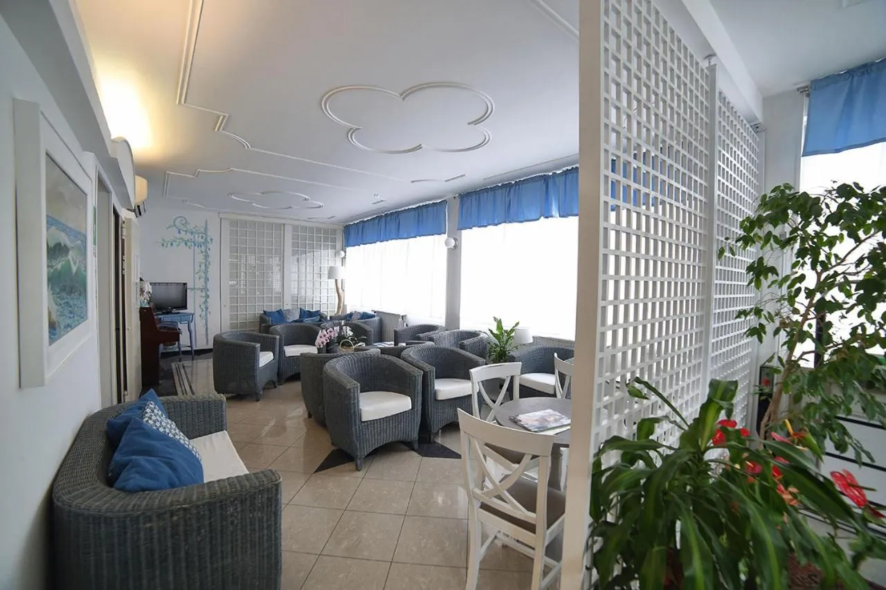 Communal lounge/ TV room in Hotel Villa Rosa