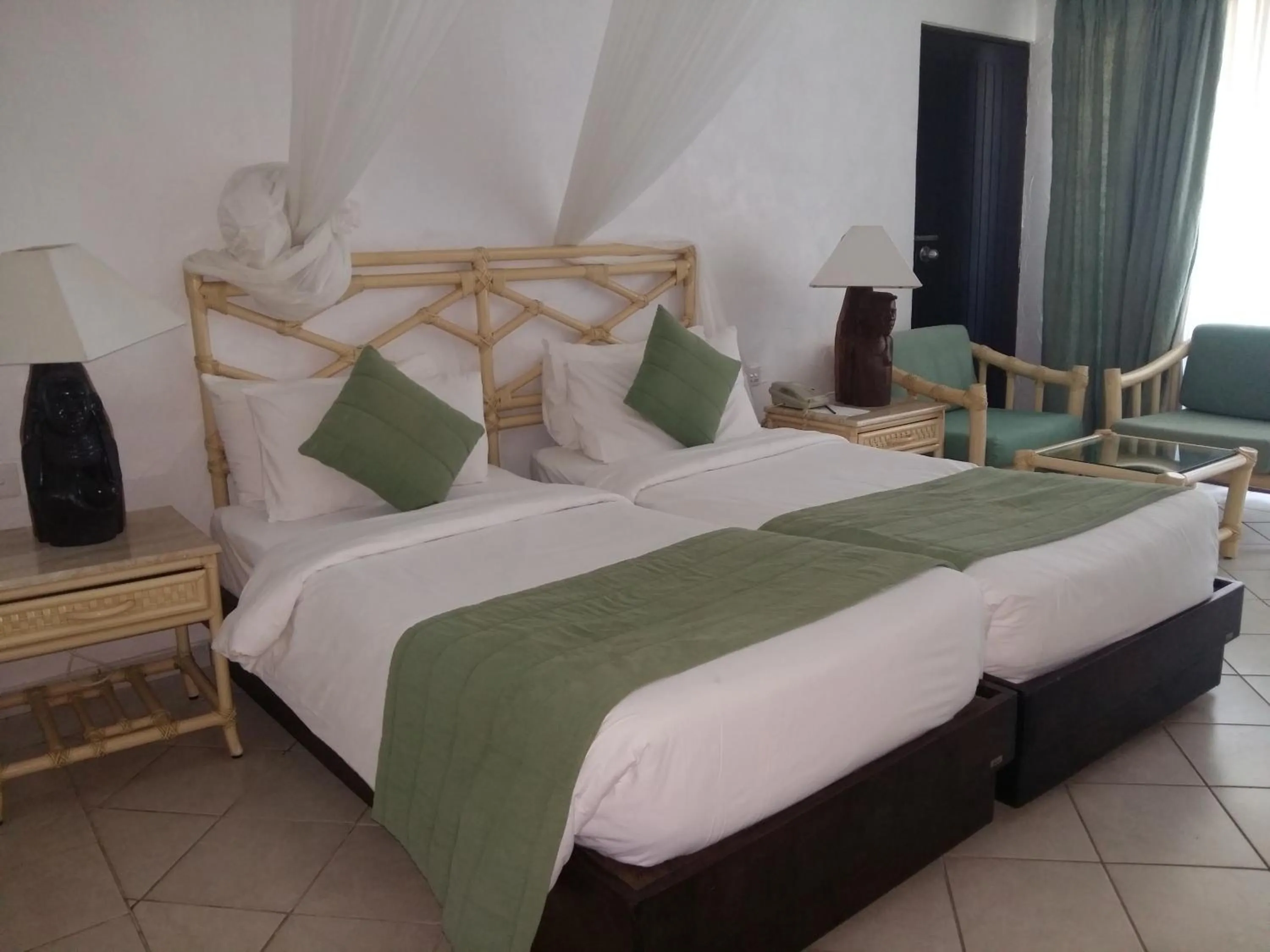 Bed in Diani Reef Beach Resort & Spa - Your Beachfront Bliss Awaits