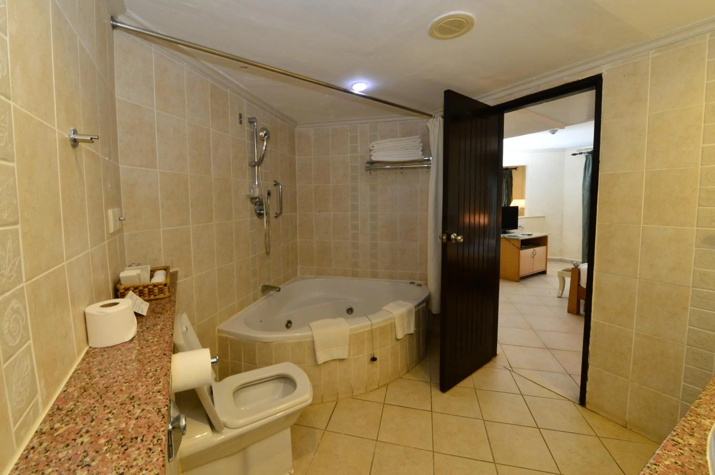 Toilet in Diani Reef Beach Resort & Spa - Your Beachfront Bliss Awaits