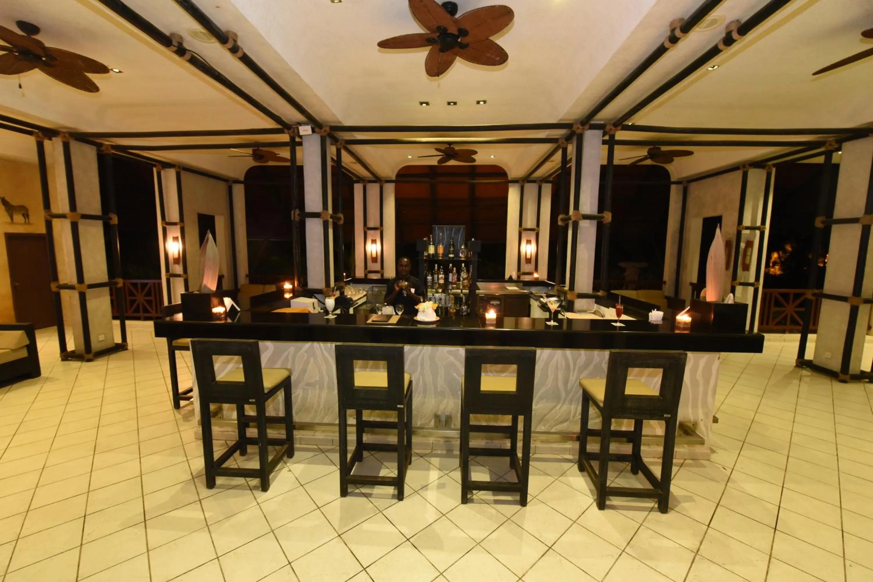 Lounge or bar in Diani Reef Beach Resort & Spa - Your Beachfront Bliss Awaits