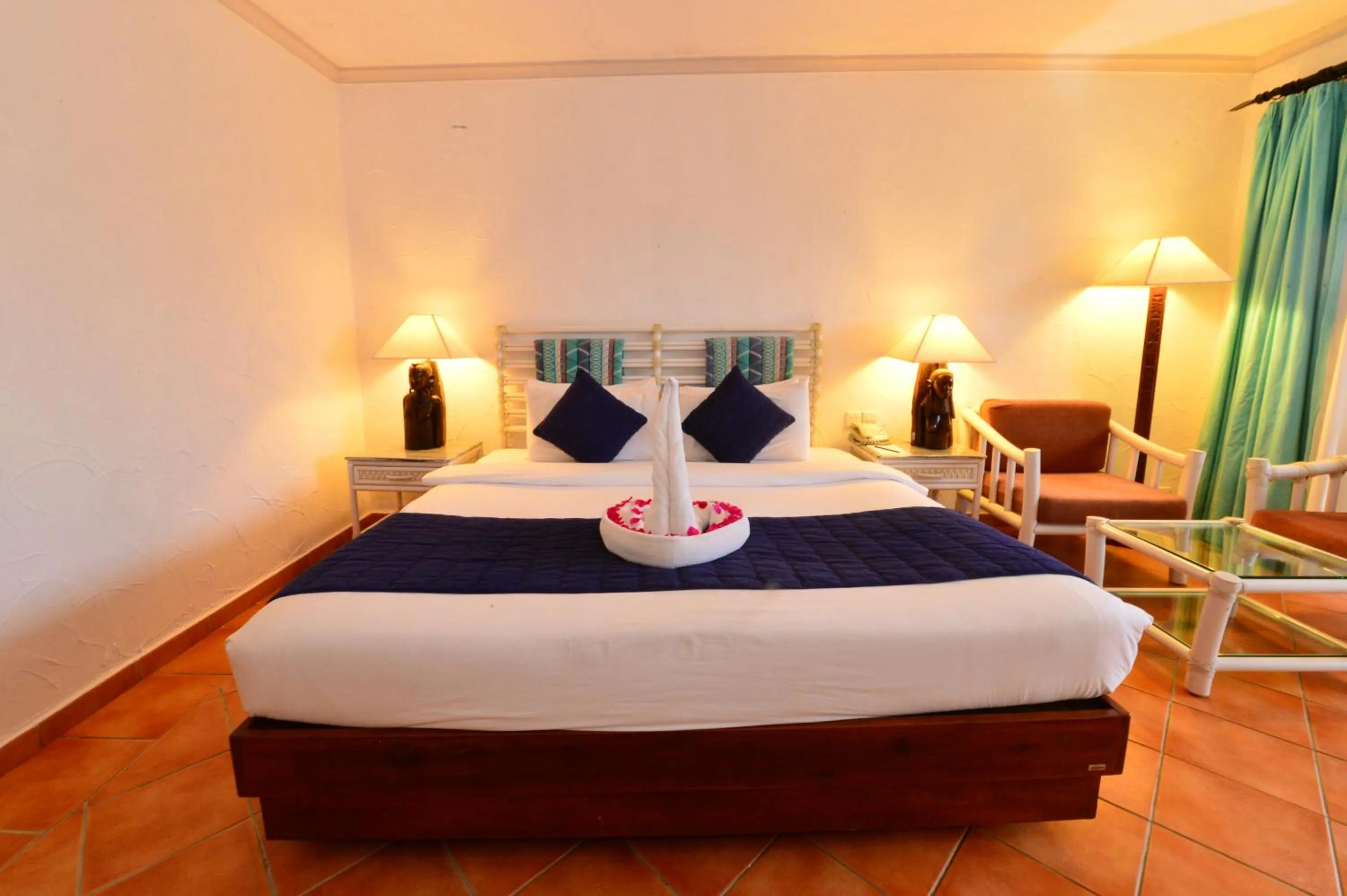 Bedroom, Bed in Diani Reef Beach Resort & Spa - Your Beachfront Bliss Awaits