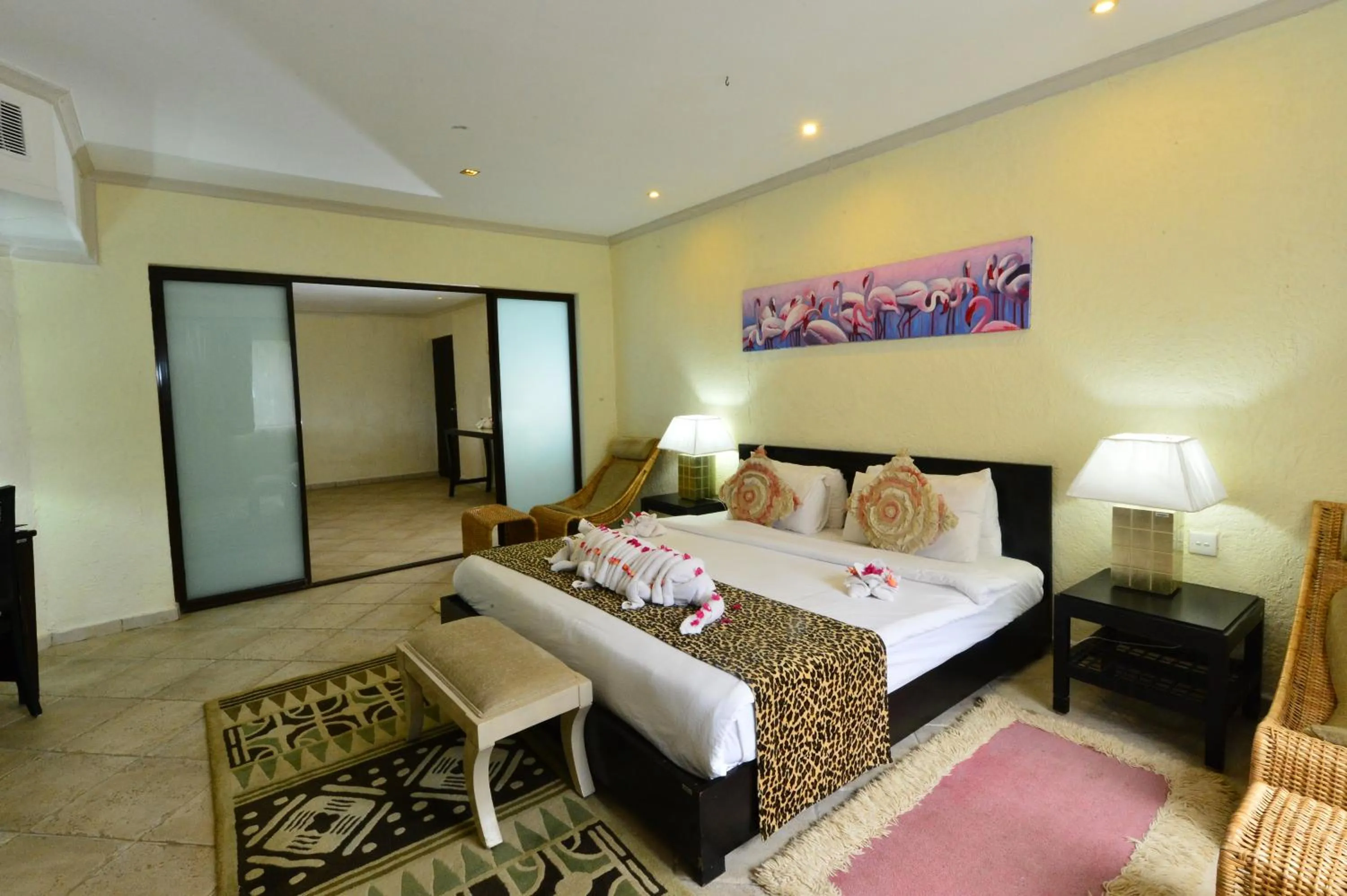 Bedroom, Bed in Diani Reef Beach Resort & Spa - Your Beachfront Bliss Awaits