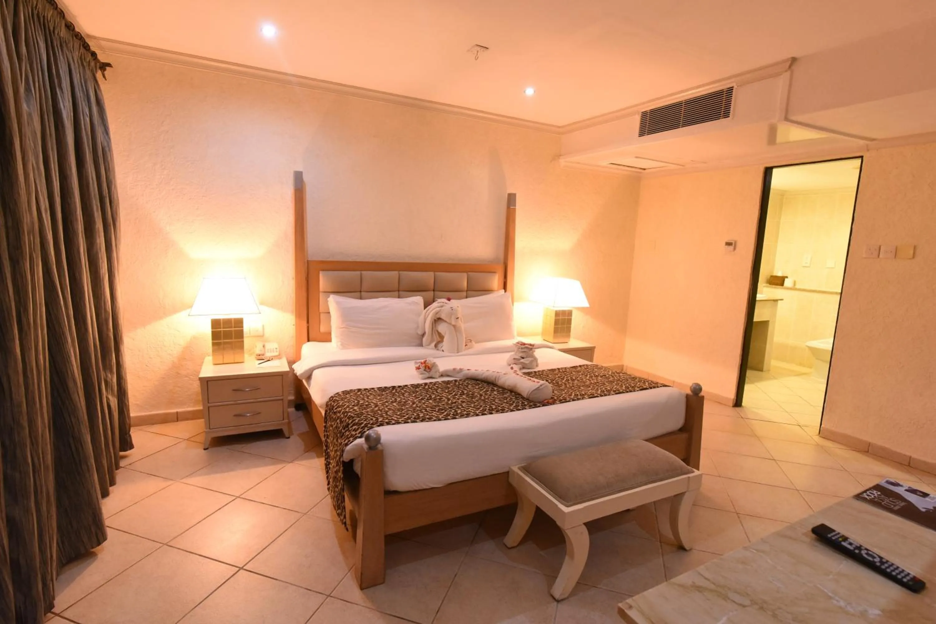 Bedroom, Bed in Diani Reef Beach Resort & Spa - Your Beachfront Bliss Awaits