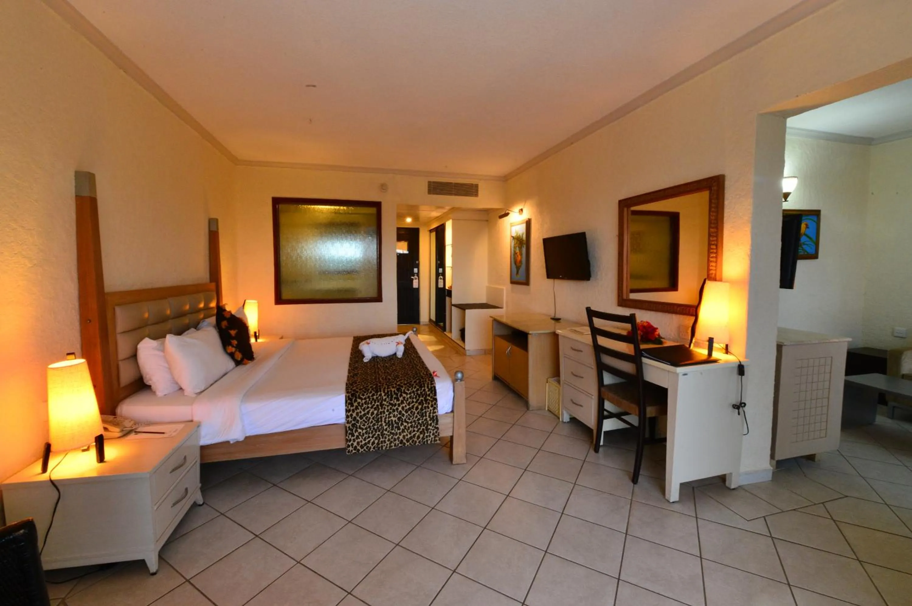 Bedroom, Bed in Diani Reef Beach Resort & Spa - Your Beachfront Bliss Awaits