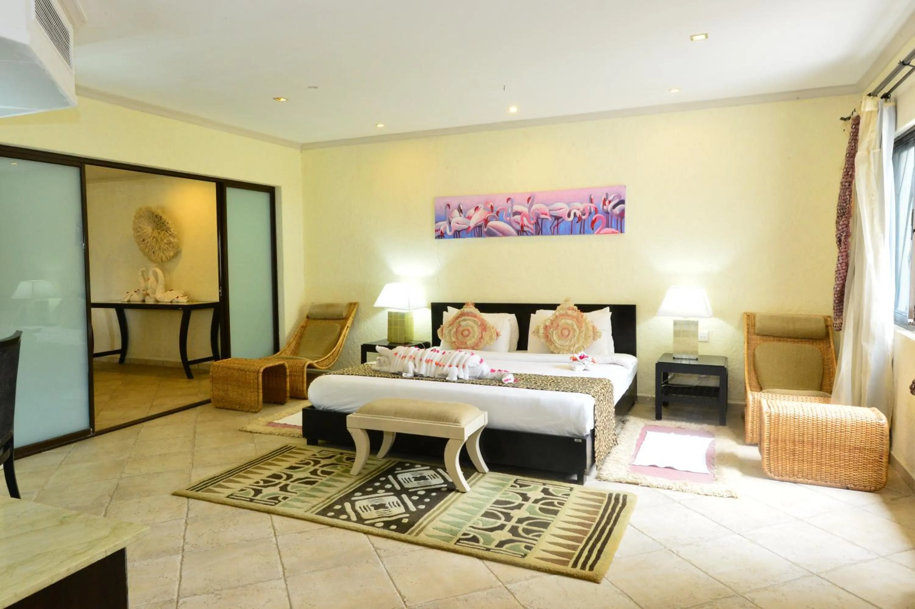 Bedroom, Bed in Diani Reef Beach Resort & Spa - Your Beachfront Bliss Awaits