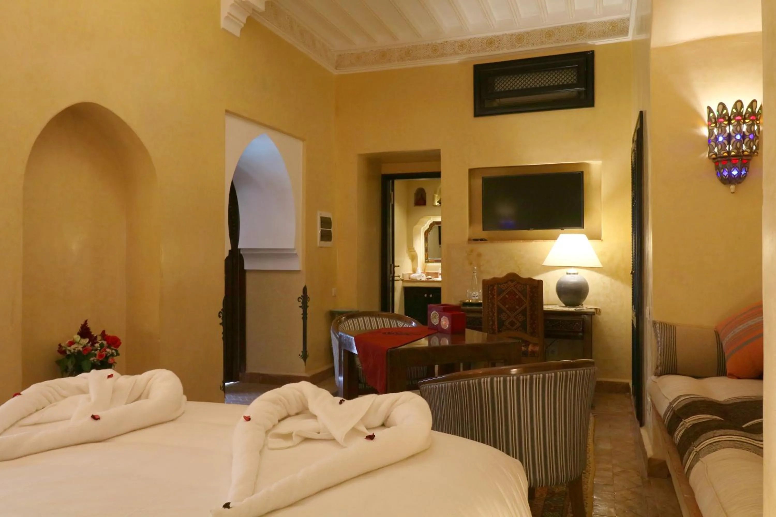 Living room, Bed in Riad Omara al Kasbah