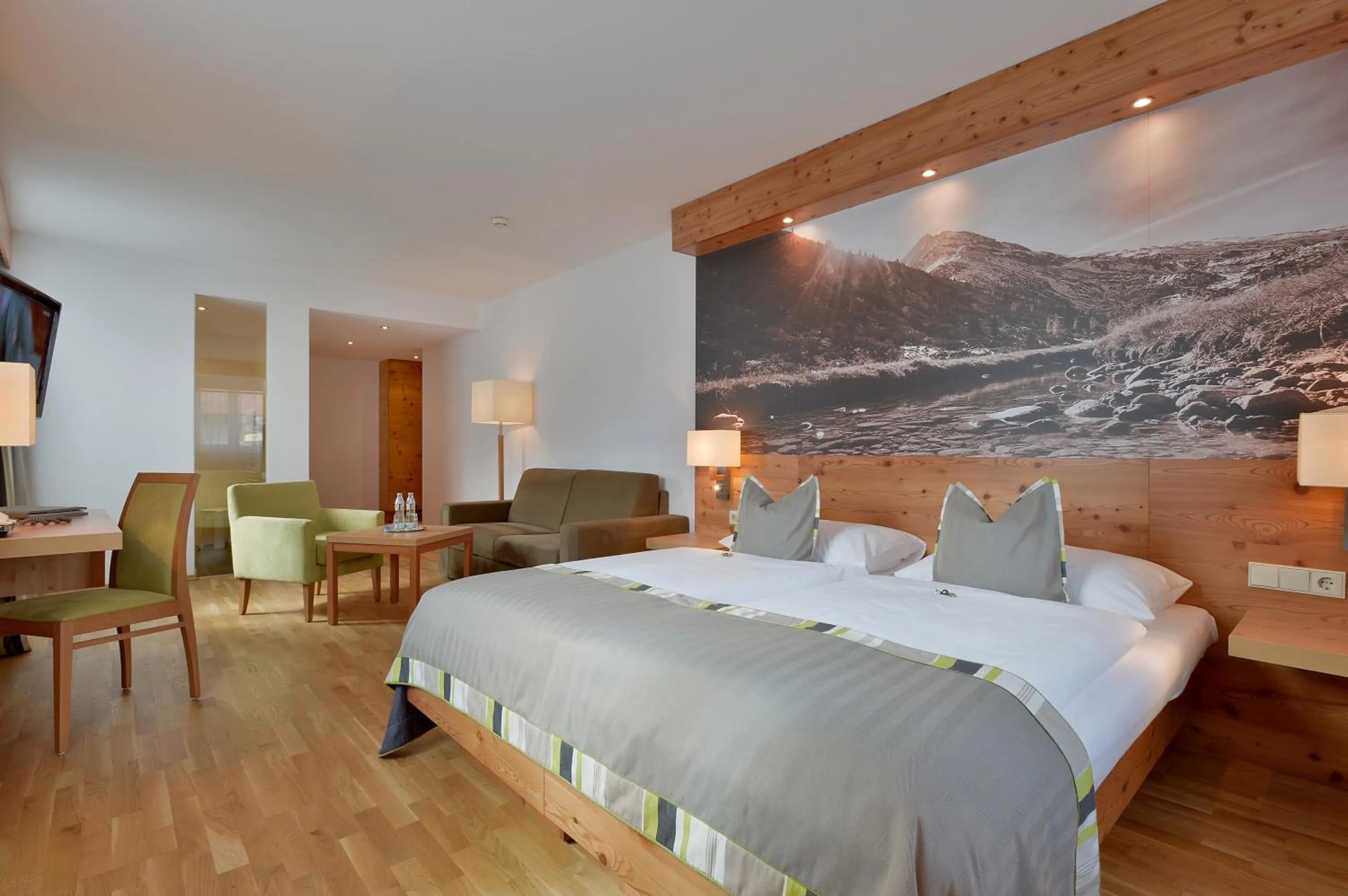 Photo of the whole room, Bed in Hotel Goldener Adler Wattens